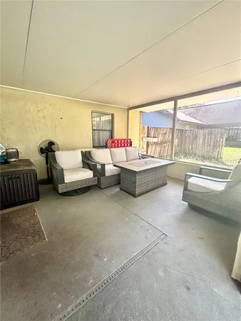 a living room with furniture and a table