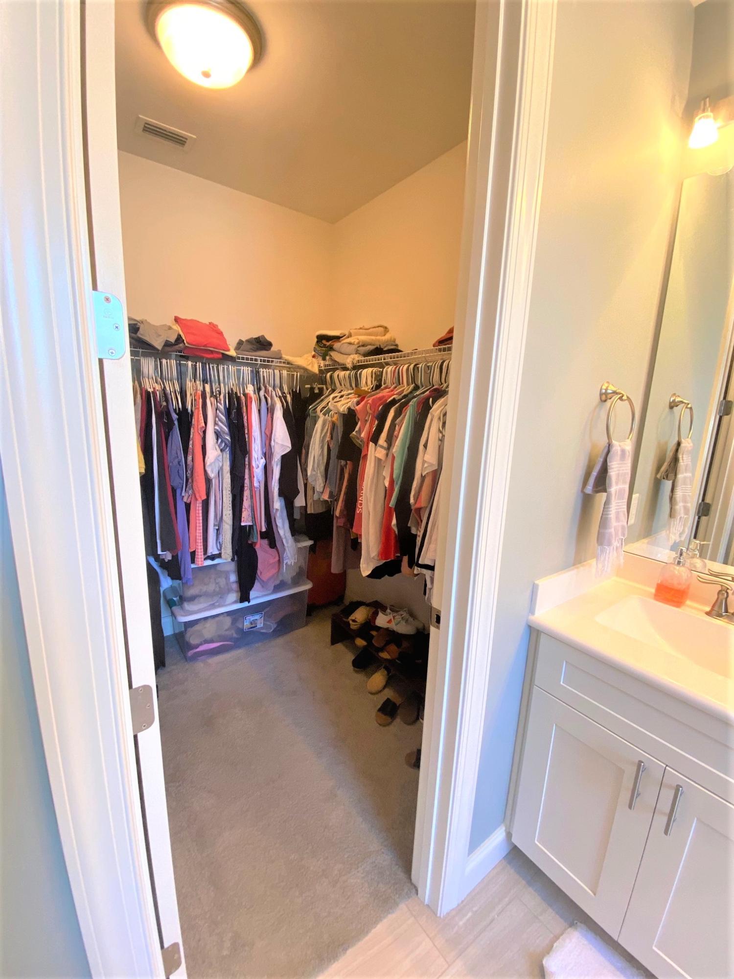 64 Hatton Court Santa Rosa Beach, FL 32459 - Photo 13 of 37 a view of walk in closet with clothes