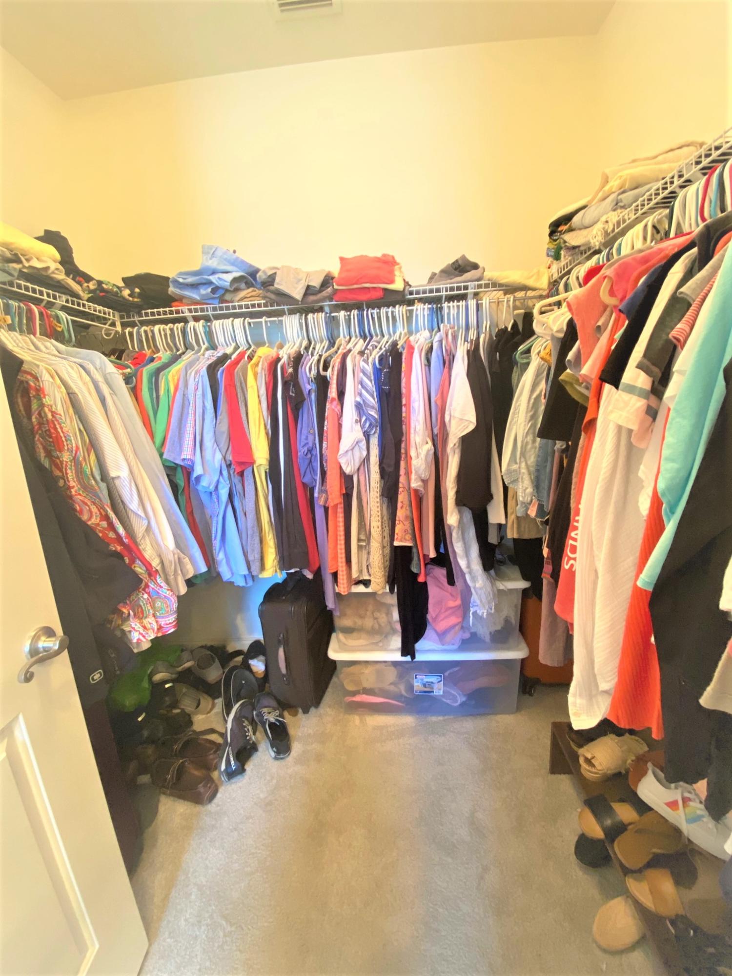 64 Hatton Court Santa Rosa Beach, FL 32459 - Photo 14 of 37 a view of walk in closet with clothes and shoes