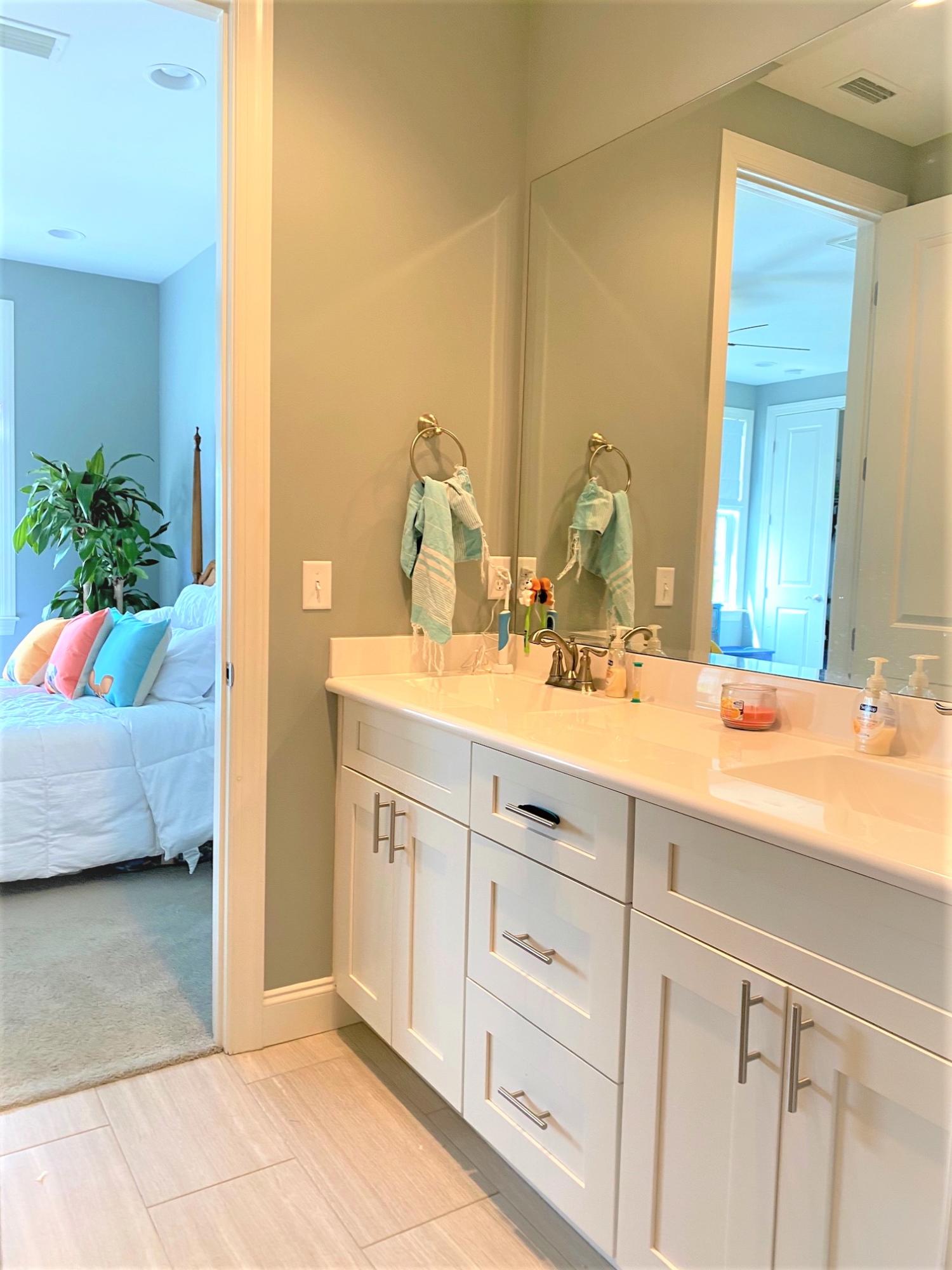 64 Hatton Court Santa Rosa Beach, FL 32459 - Photo 19 of 37 a bathroom with a sink and a mirror