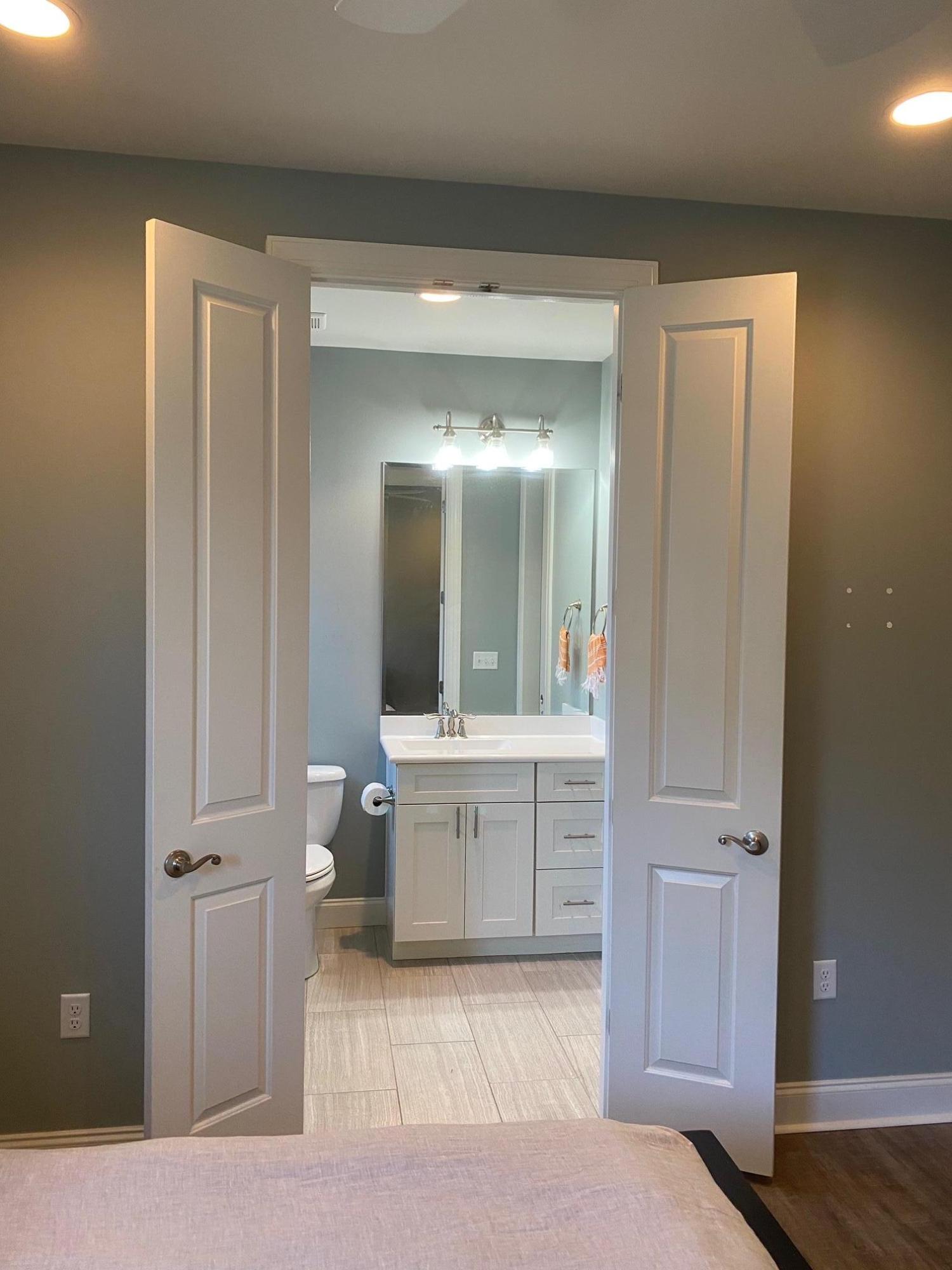 64 Hatton Court Santa Rosa Beach, FL 32459 - Photo 22 of 37 a bathroom with a sink a mirror and a bathtub
