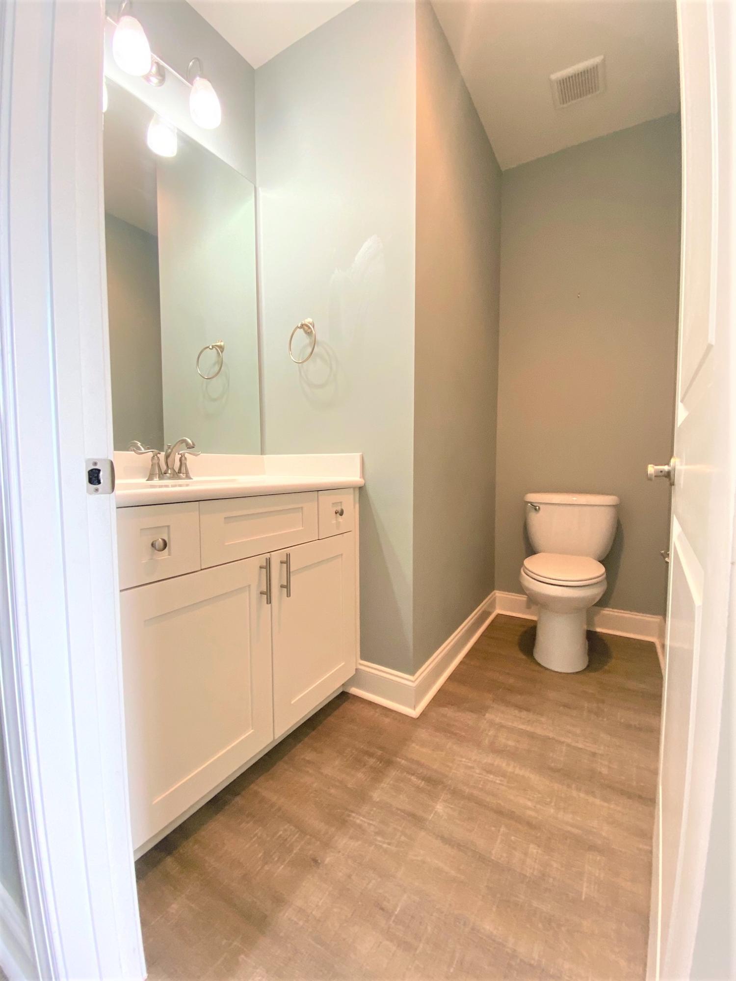 64 Hatton Court Santa Rosa Beach, FL 32459 - Photo 28 of 37 a bathroom with a sink a toilet and a mirror