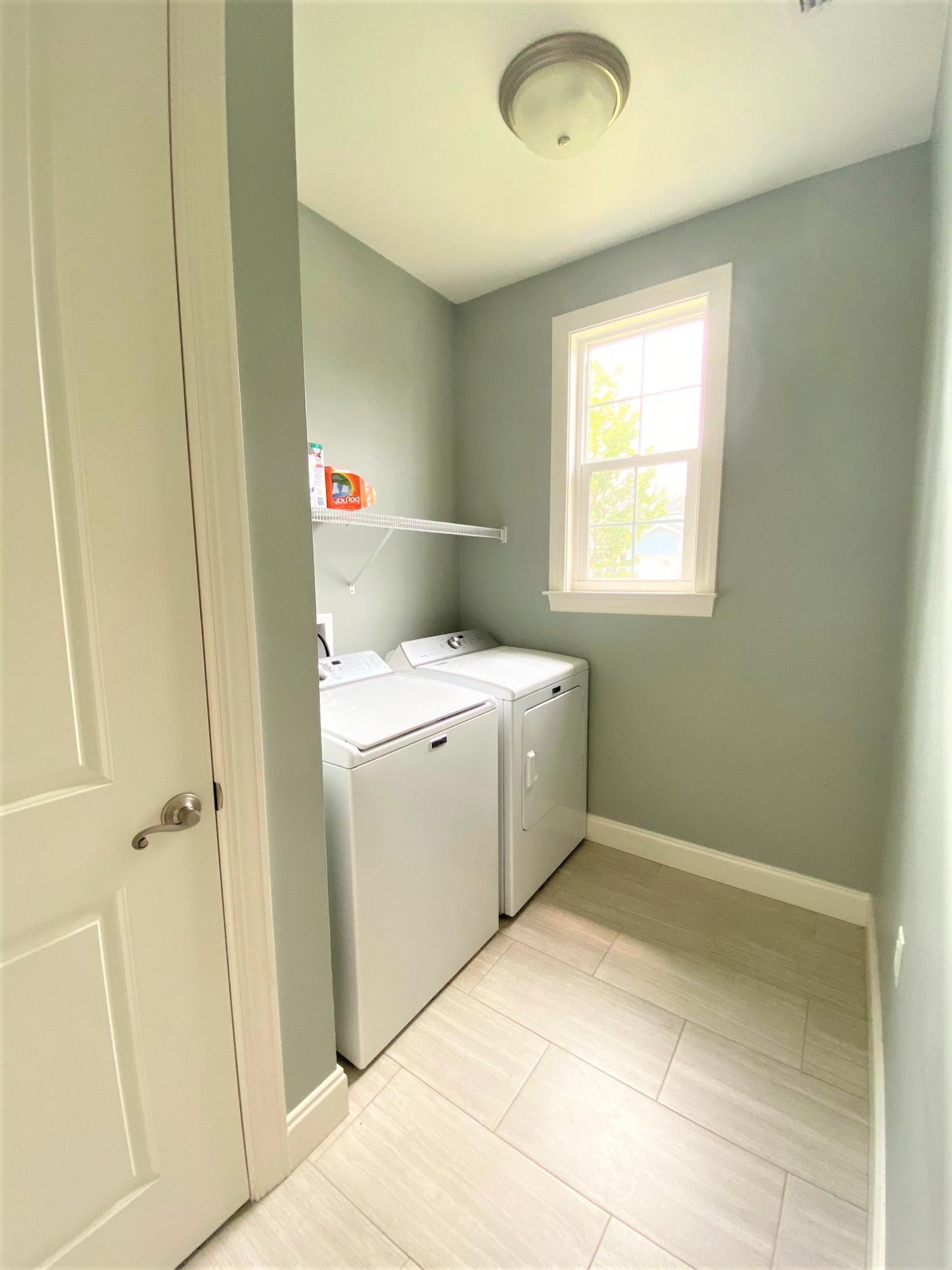 64 Hatton Court Santa Rosa Beach, FL 32459 - Photo 29 of 37 a utility room with a window dryer and washer