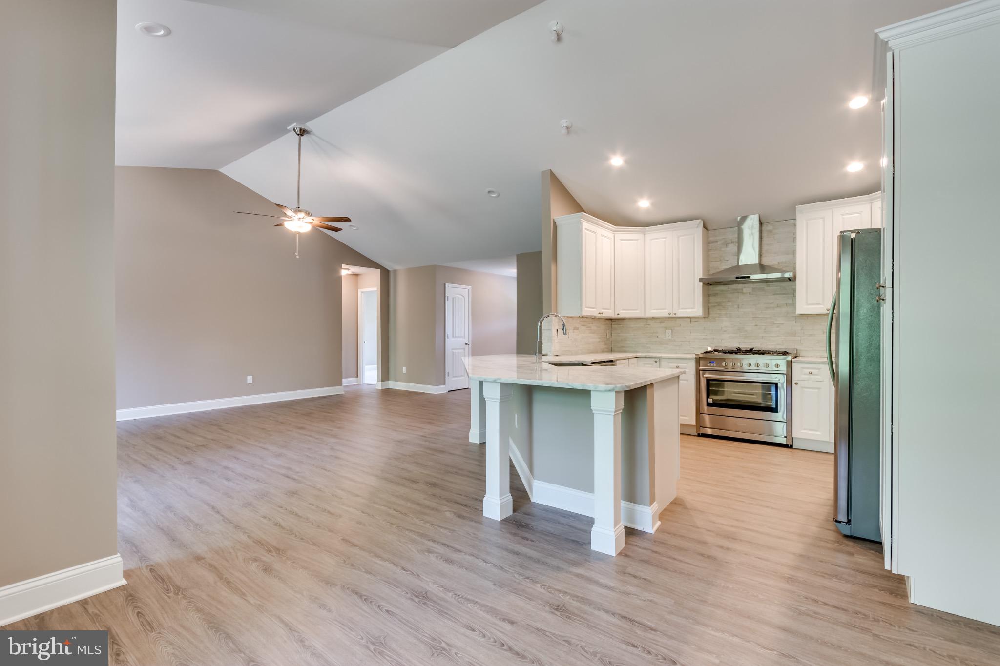 1 Libby's Ridge Road Berkeley Springs, WV 25411 - Photo 12 of 31 a view of kitchen with refrigerator and window