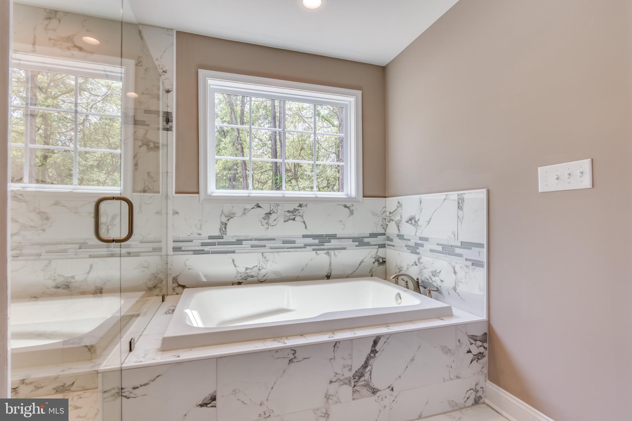 1 Libby's Ridge Road Berkeley Springs, WV 25411 - Photo 24 of 31 a bathroom with a bathtub and a sink