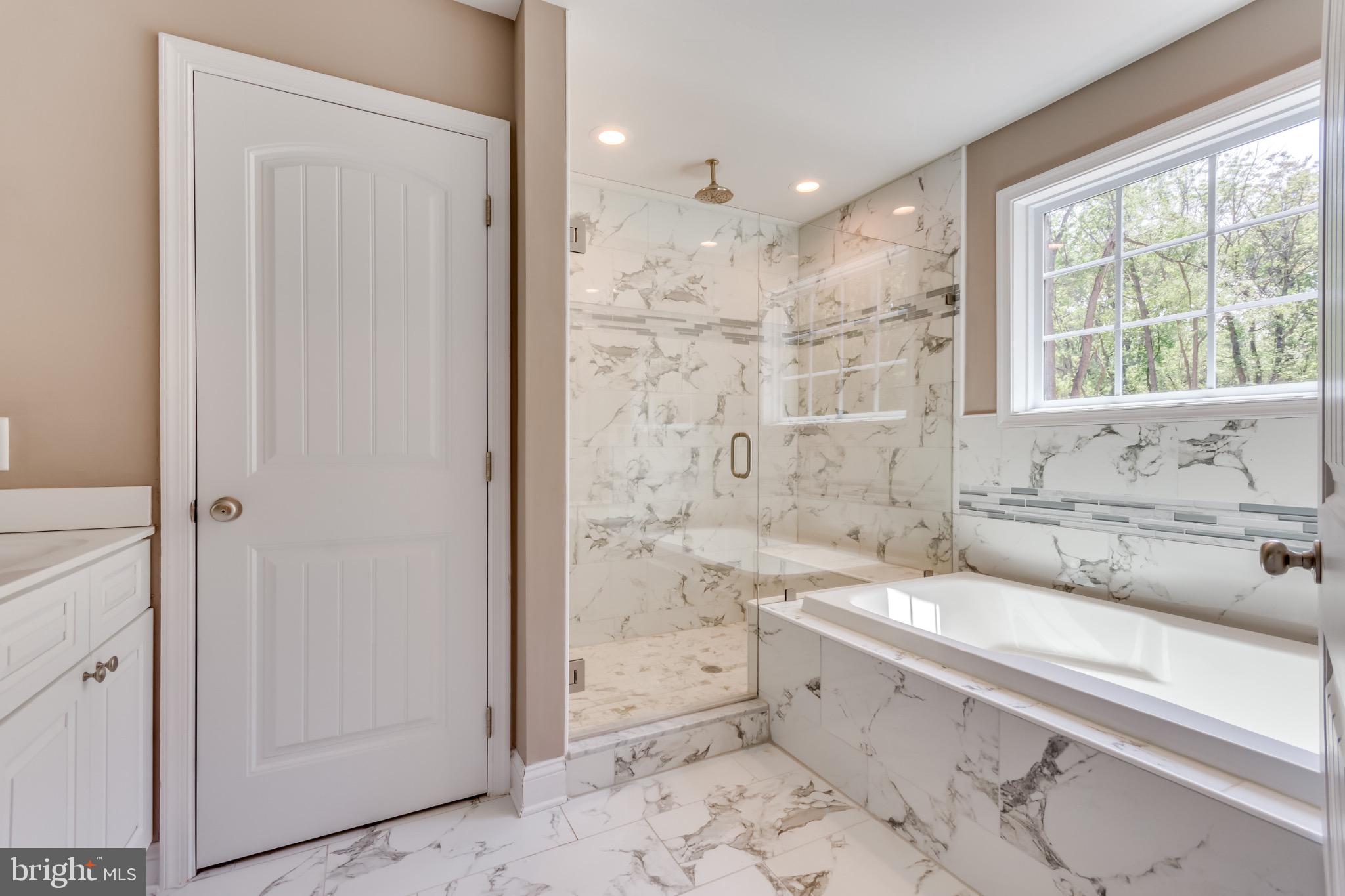 1 Libby's Ridge Road Berkeley Springs, WV 25411 - Photo 25 of 31 a bathroom with a bathtub and a sink