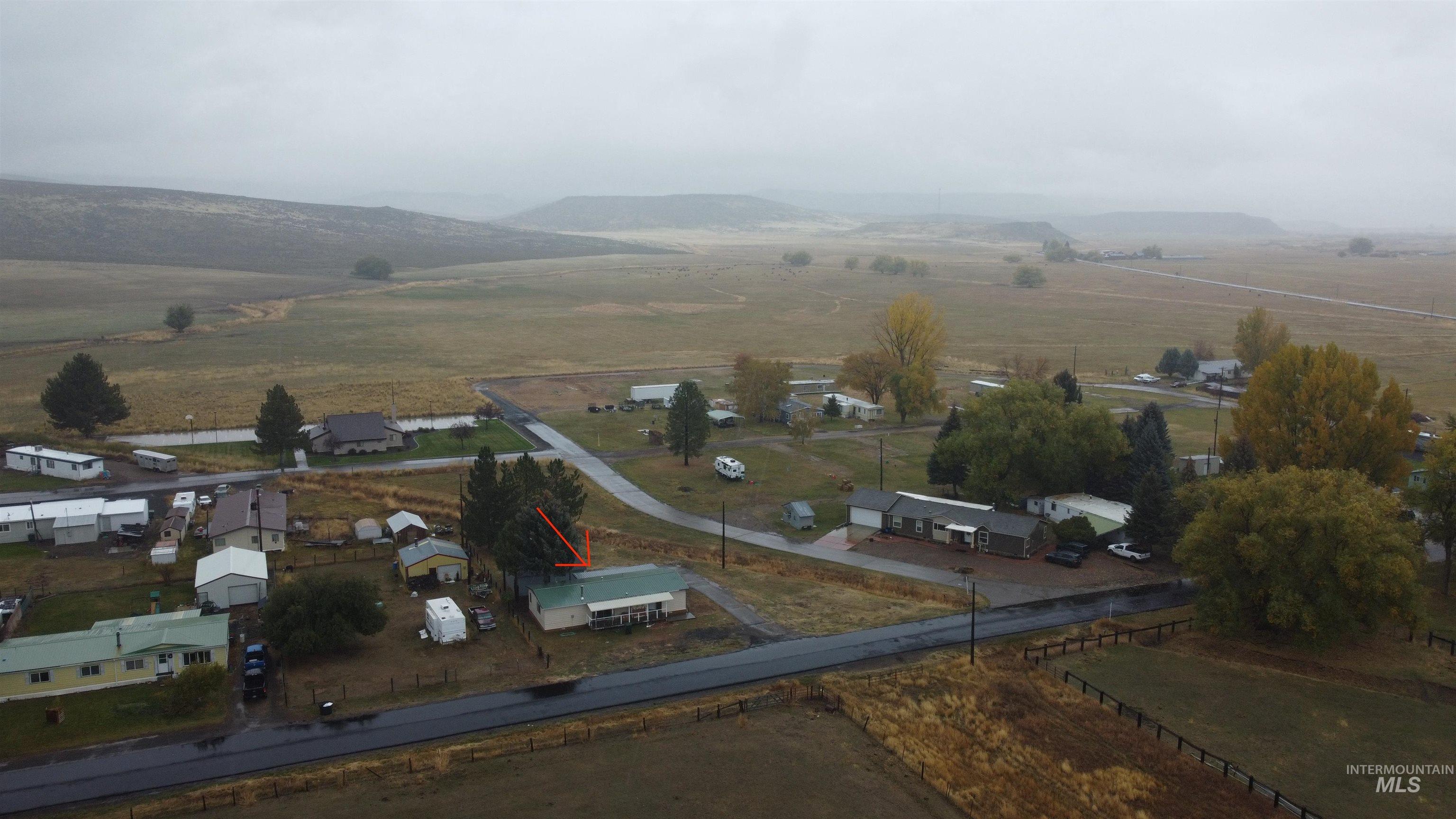 500 Somerville Street Jordan Valley, OR 97910 - Photo 10 of 35 Aerial view of property's location with mountains and rural landscape