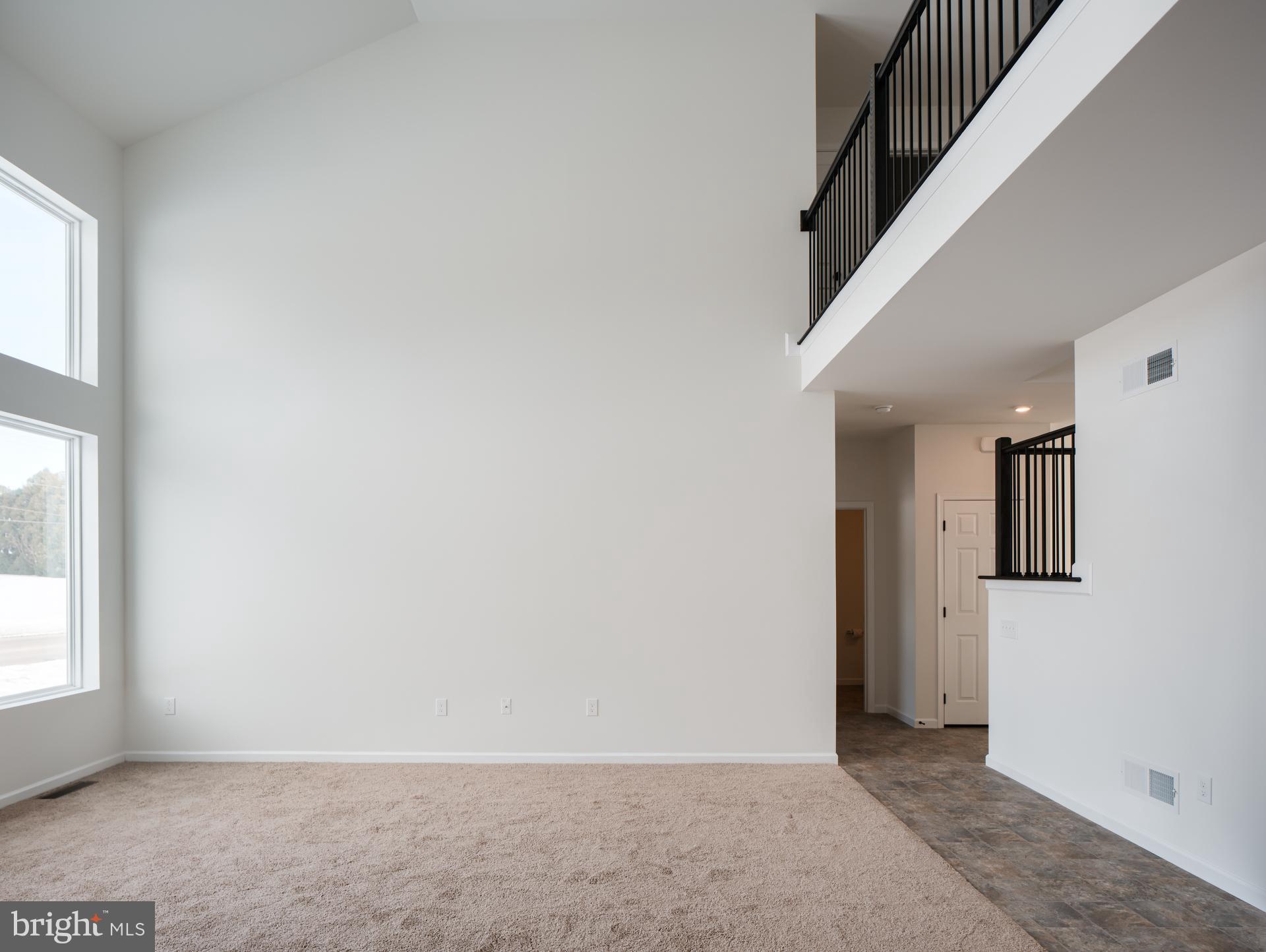 415 Little Walnut Court Windsor, PA 17366 - Photo 20 of 53 a view of an empty room with stairs