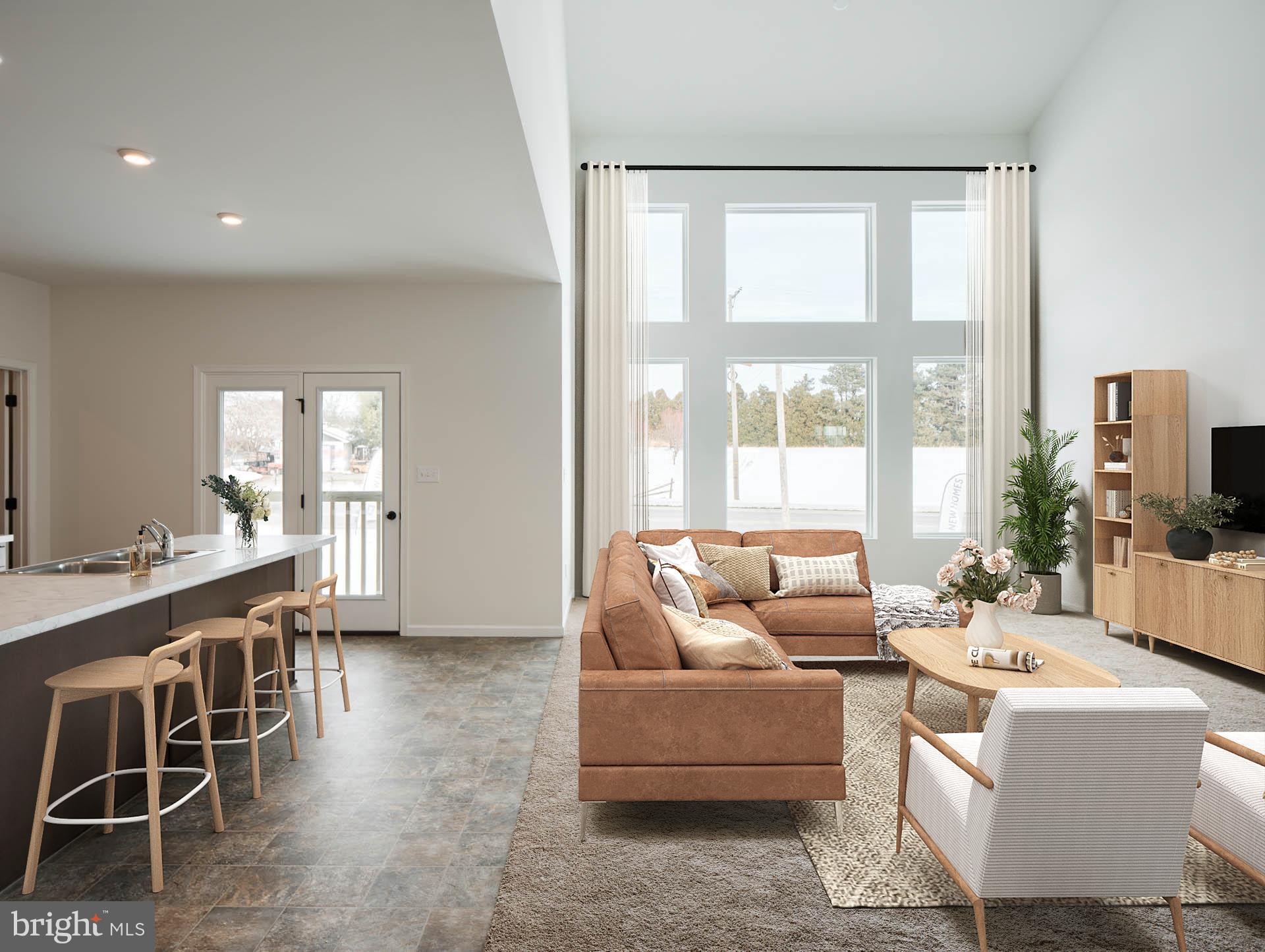 415 Little Walnut Court Windsor, PA 17366 - Photo 2 of 53 a living room with furniture a large window and wooden floor