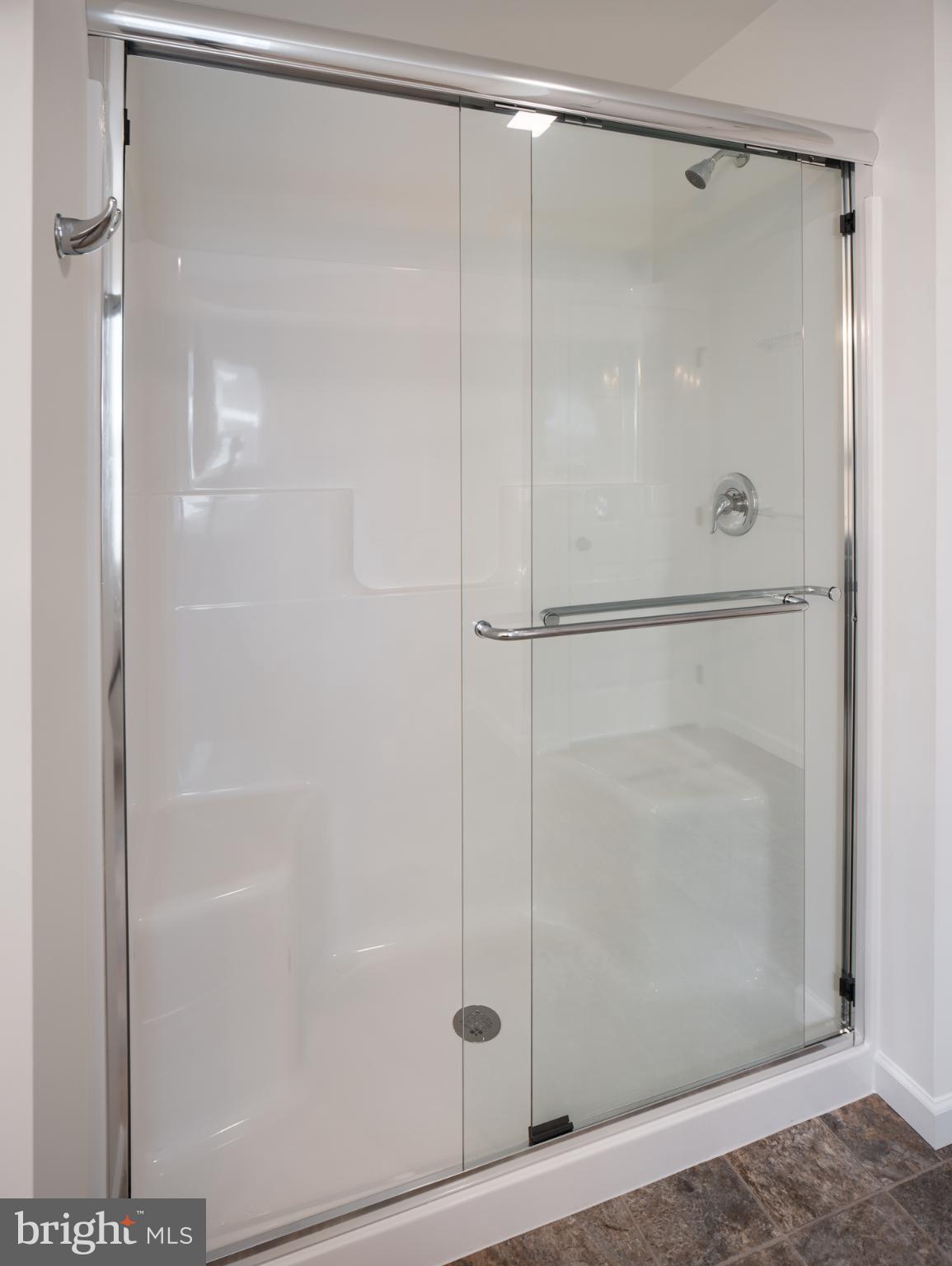 415 Little Walnut Court Windsor, PA 17366 - Photo 35 of 53 a bathroom with a glass shower door