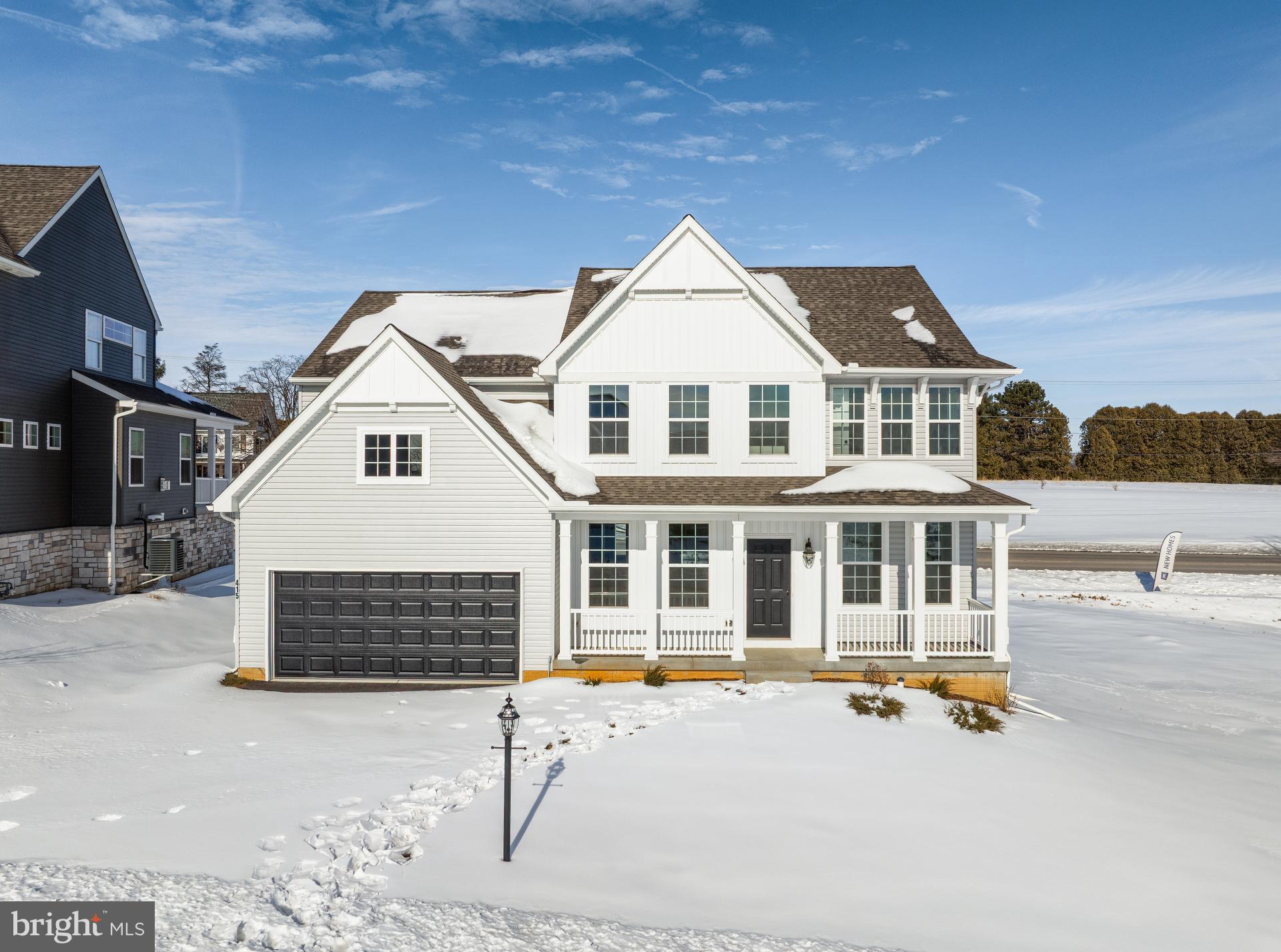 415 Little Walnut Court Windsor, PA 17366 - Photo 45 of 53 a front view of a house with a yard