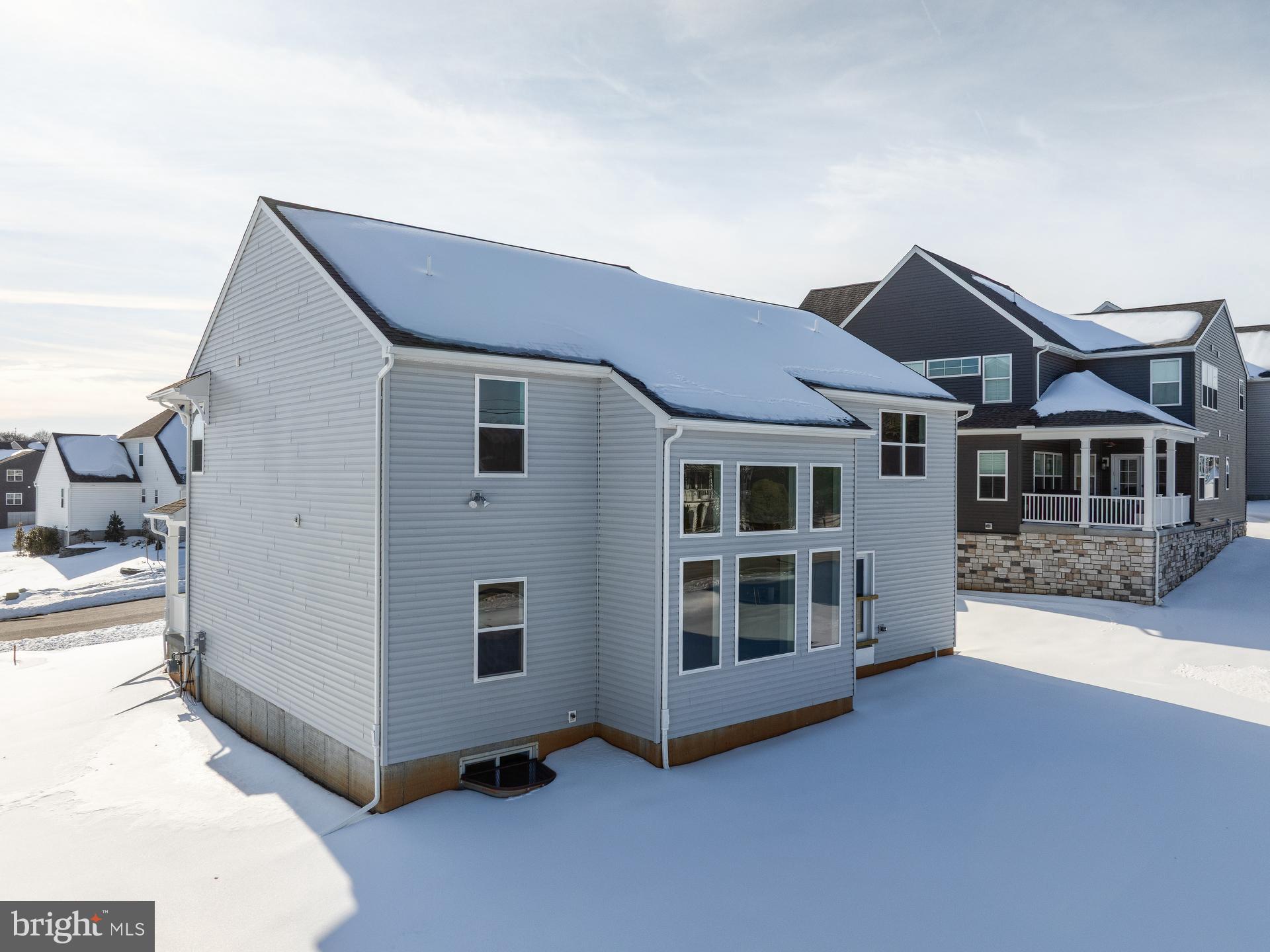 415 Little Walnut Court Windsor, PA 17366 - Photo 49 of 53 a view of a house with big yard and large windows