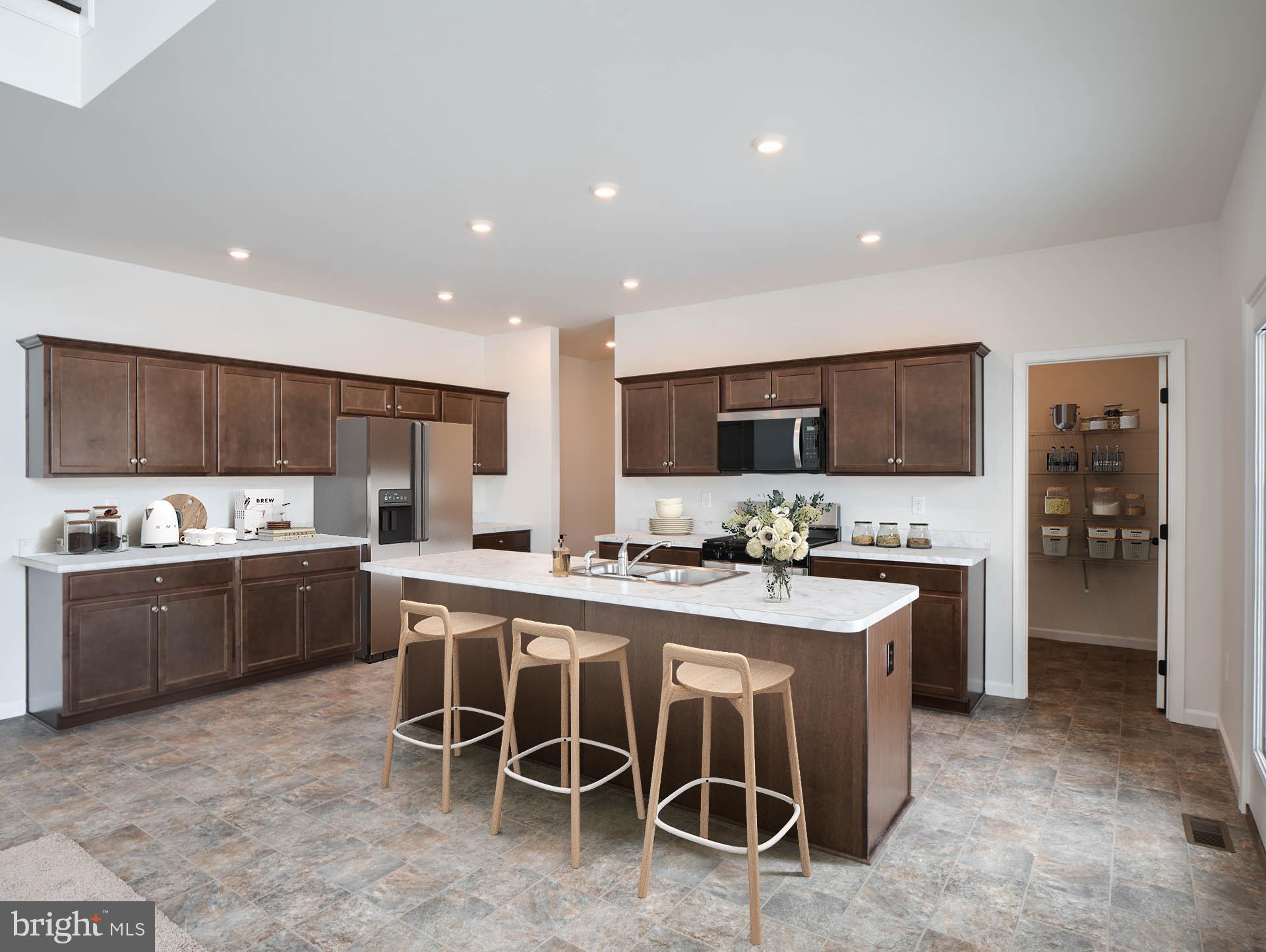 415 Little Walnut Court Windsor, PA 17366 - Photo 5 of 53 a kitchen with appliances a sink a counter top space cabinets and stainless steel appliances