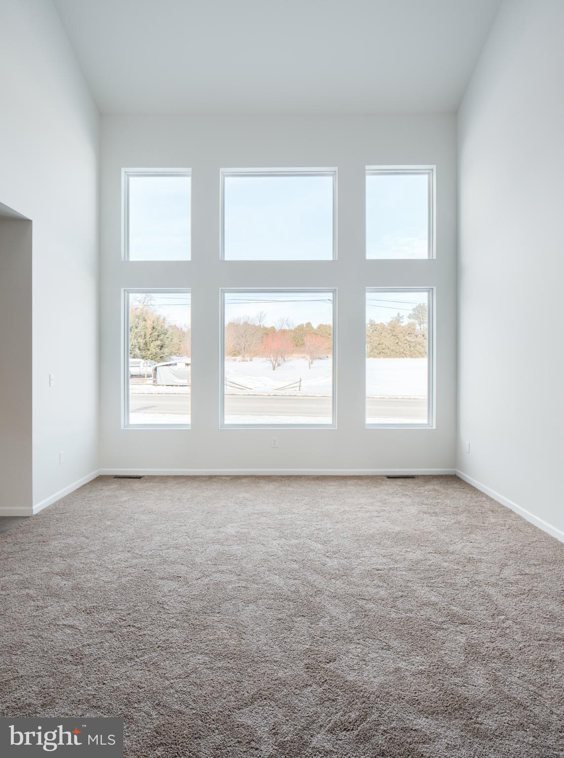 415 Little Walnut Court Windsor, PA 17366 - Photo 8 of 53 an empty room with windows
