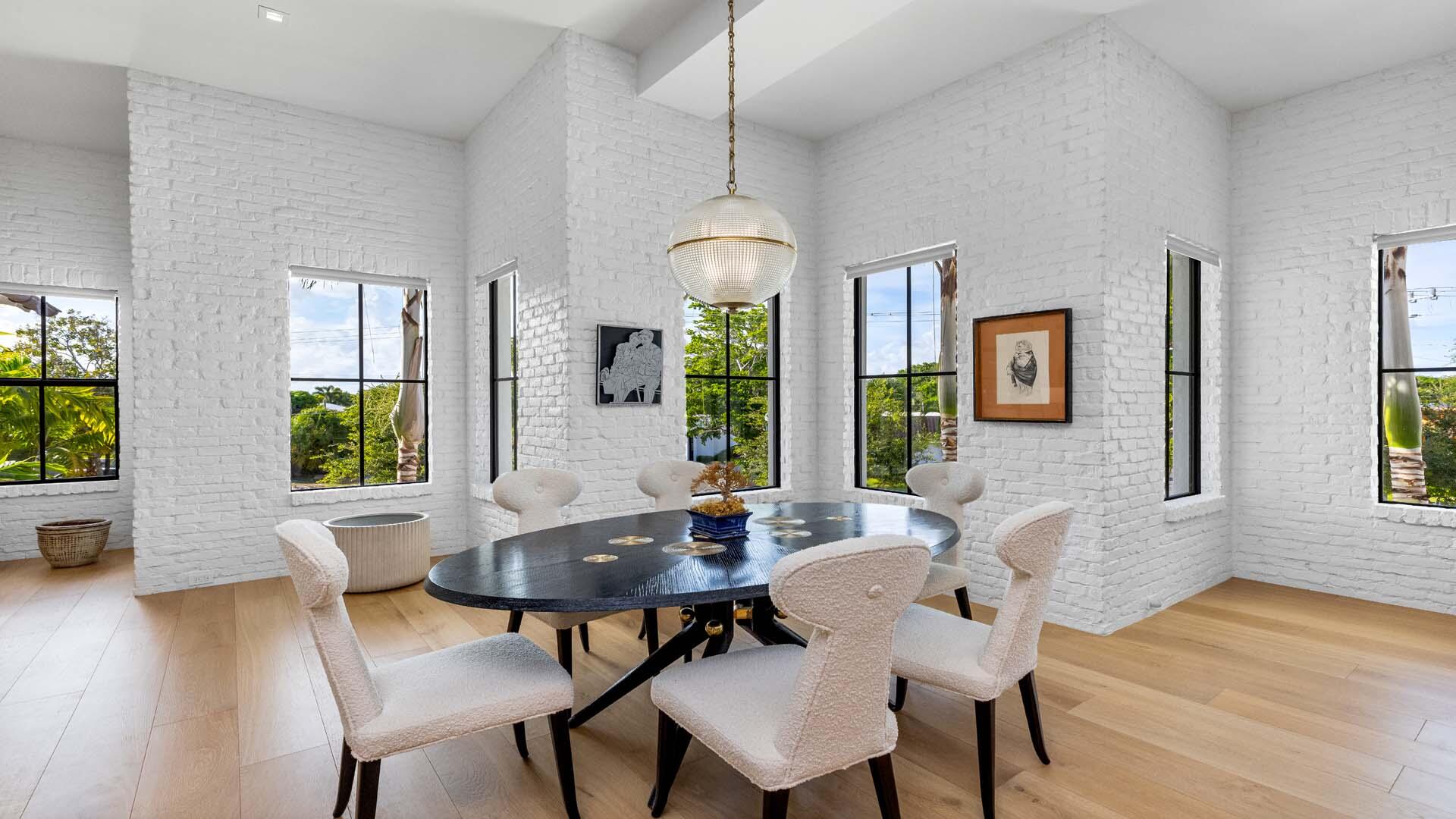 230 George Bush Boulevard Delray Beach, FL 33444 - Photo 11 of 51 a dining room with furniture and window