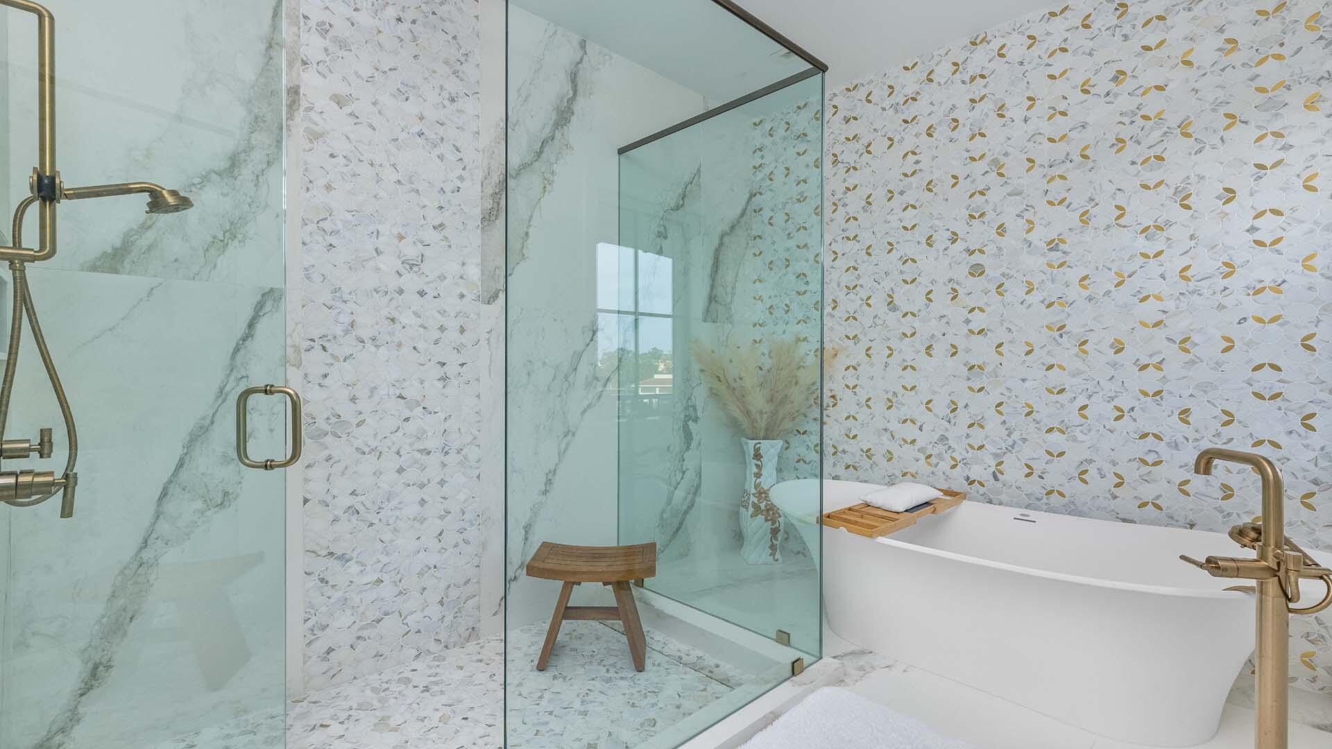 230 George Bush Boulevard Delray Beach, FL 33444 - Photo 26 of 51 a bathroom with a bathtub and a shower
