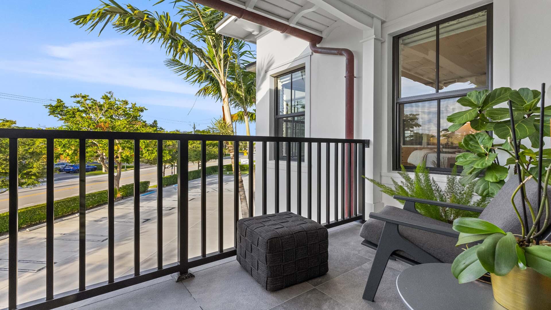 230 George Bush Boulevard Delray Beach, FL 33444 - Photo 27 of 51 a view of a balcony with chairs