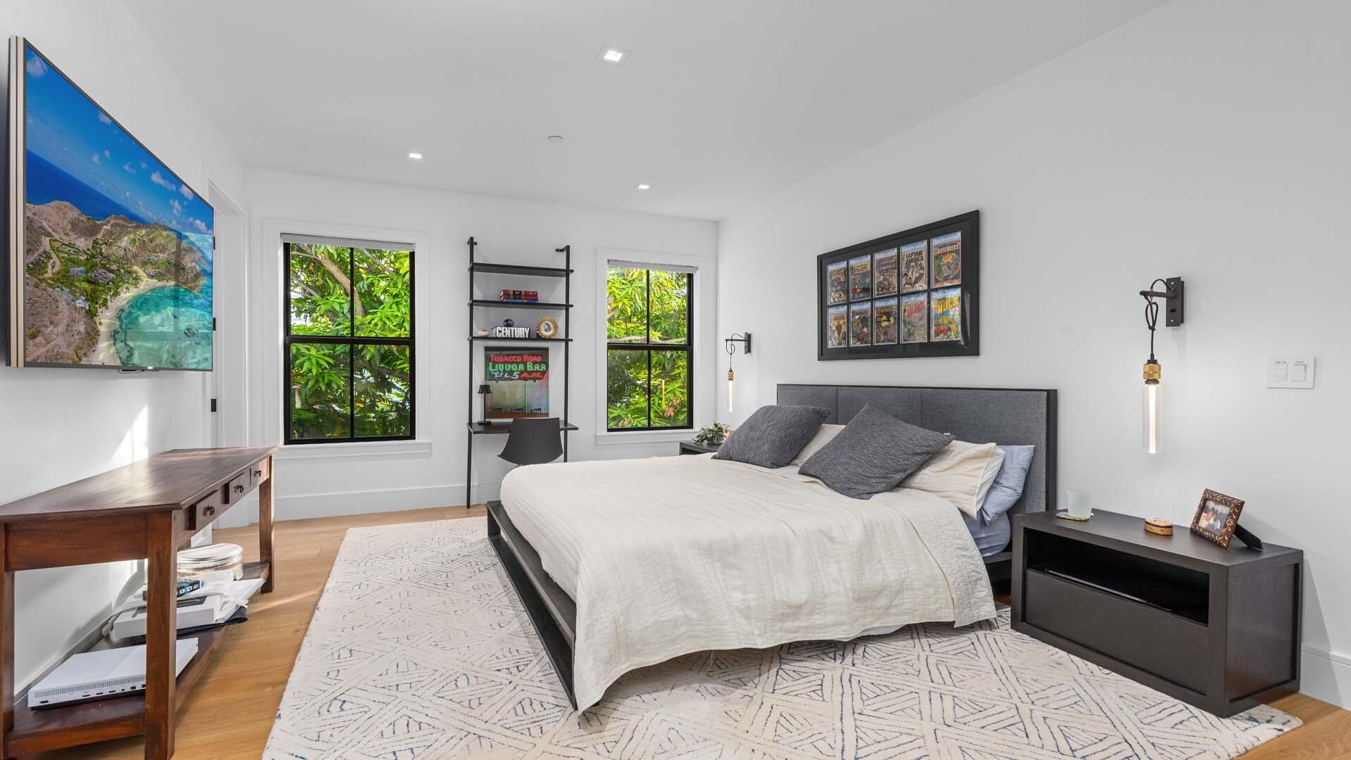 230 George Bush Boulevard Delray Beach, FL 33444 - Photo 28 of 51 a bedroom with a large bed and a window