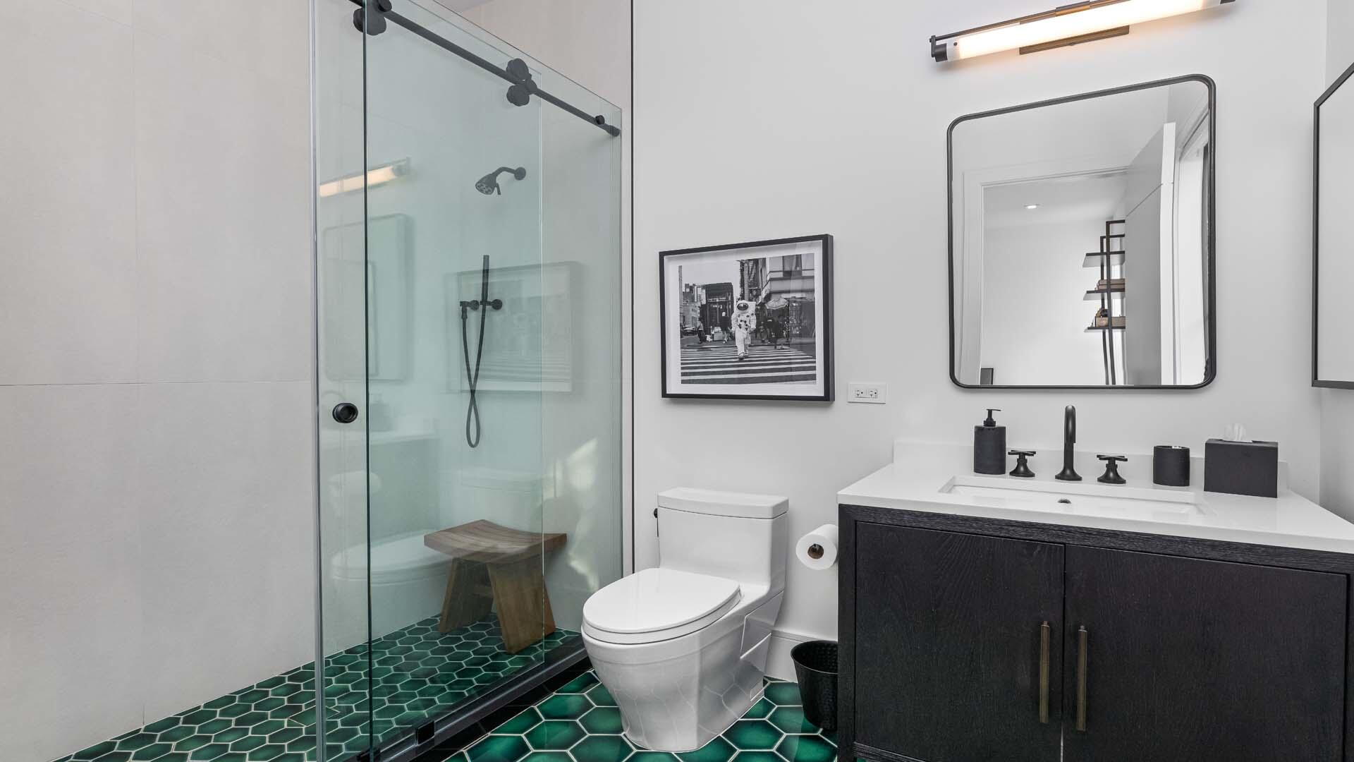 230 George Bush Boulevard Delray Beach, FL 33444 - Photo 29 of 51 a bathroom with a toilet sink and shower