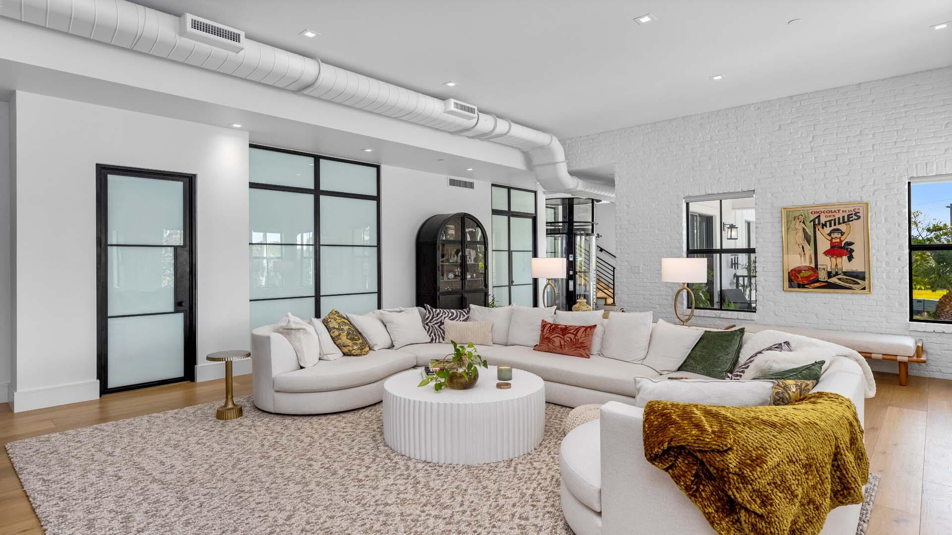 230 George Bush Boulevard Delray Beach, FL 33444 - Photo 9 of 51 a living room with furniture and wooden floor