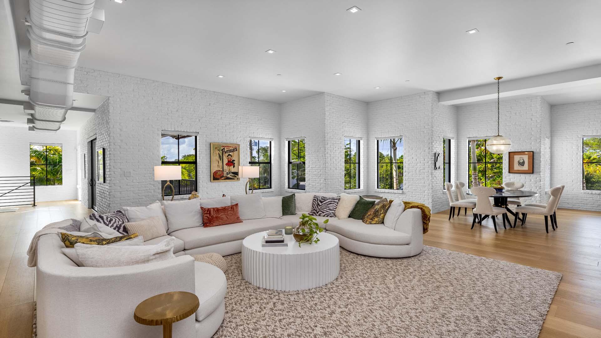 230 George Bush Boulevard Delray Beach, FL 33444 - Photo 10 of 51 a living room with furniture and a large window