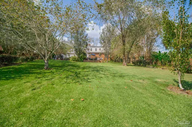 a view of a house with a garden