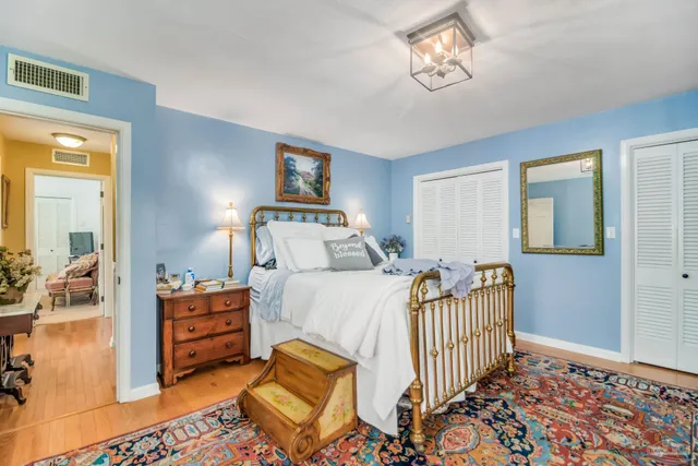 a large kitchen with a table and chairs