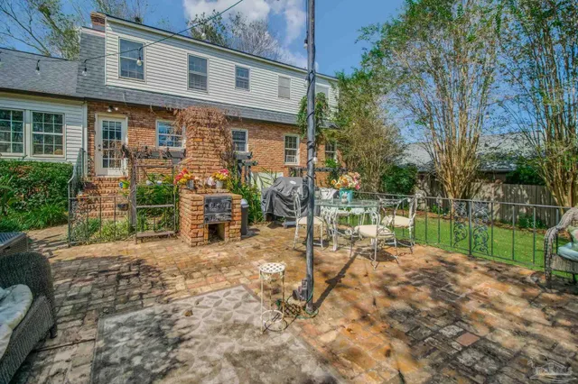 a view of a park with large trees