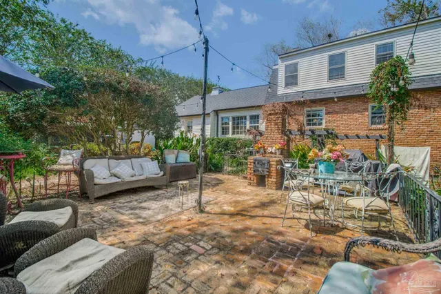 a view of a building with a yard