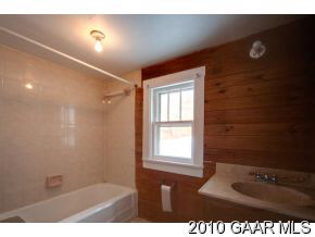 3832 Dry Hollow Road Dayton, VA 22821 - Photo 6 of 8 a bathroom with a sink and a mirror