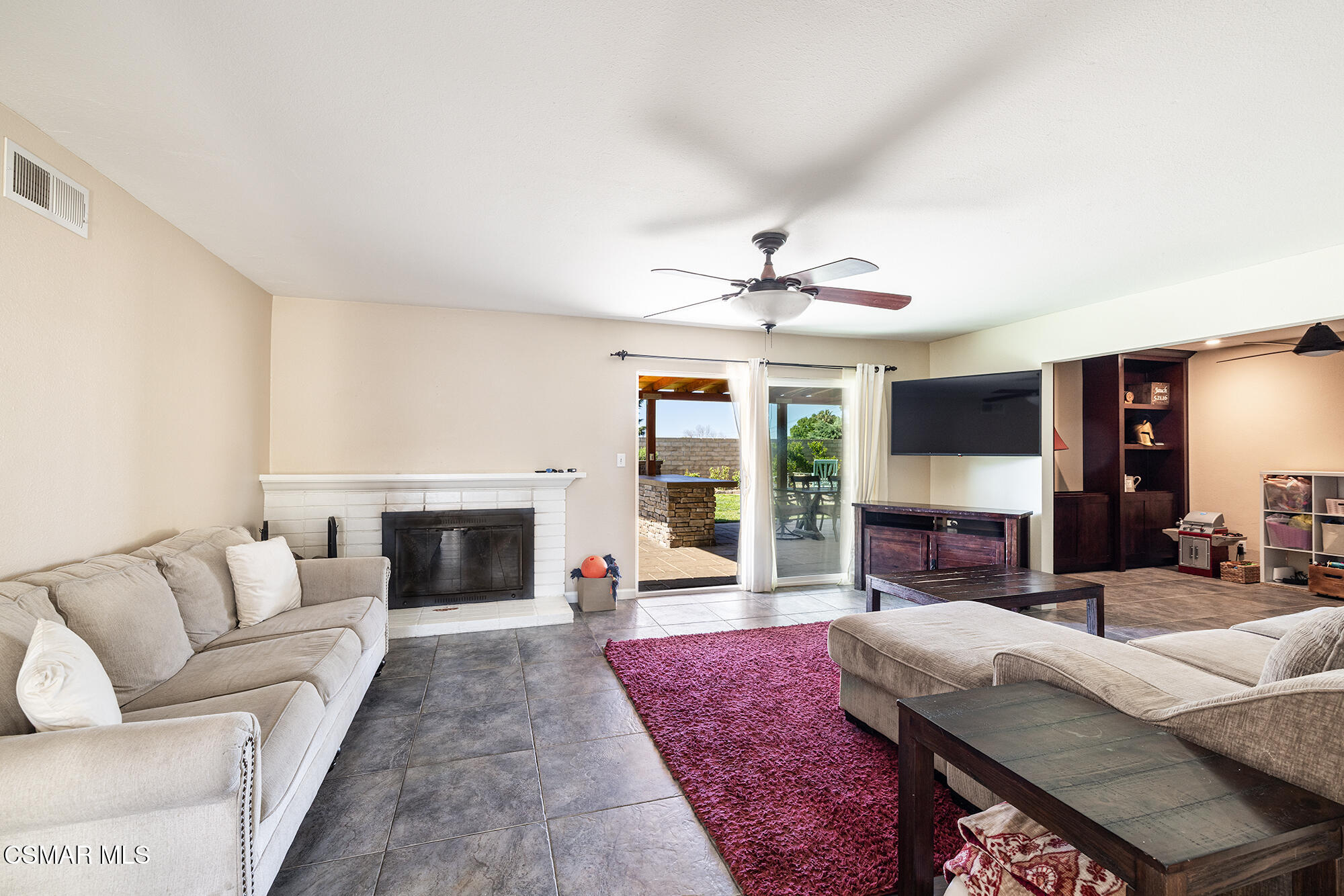 4828 Walnut Avenue Simi Valley, CA 93063 - Photo 11 of 25 a living room with fireplace furniture and a fireplace
