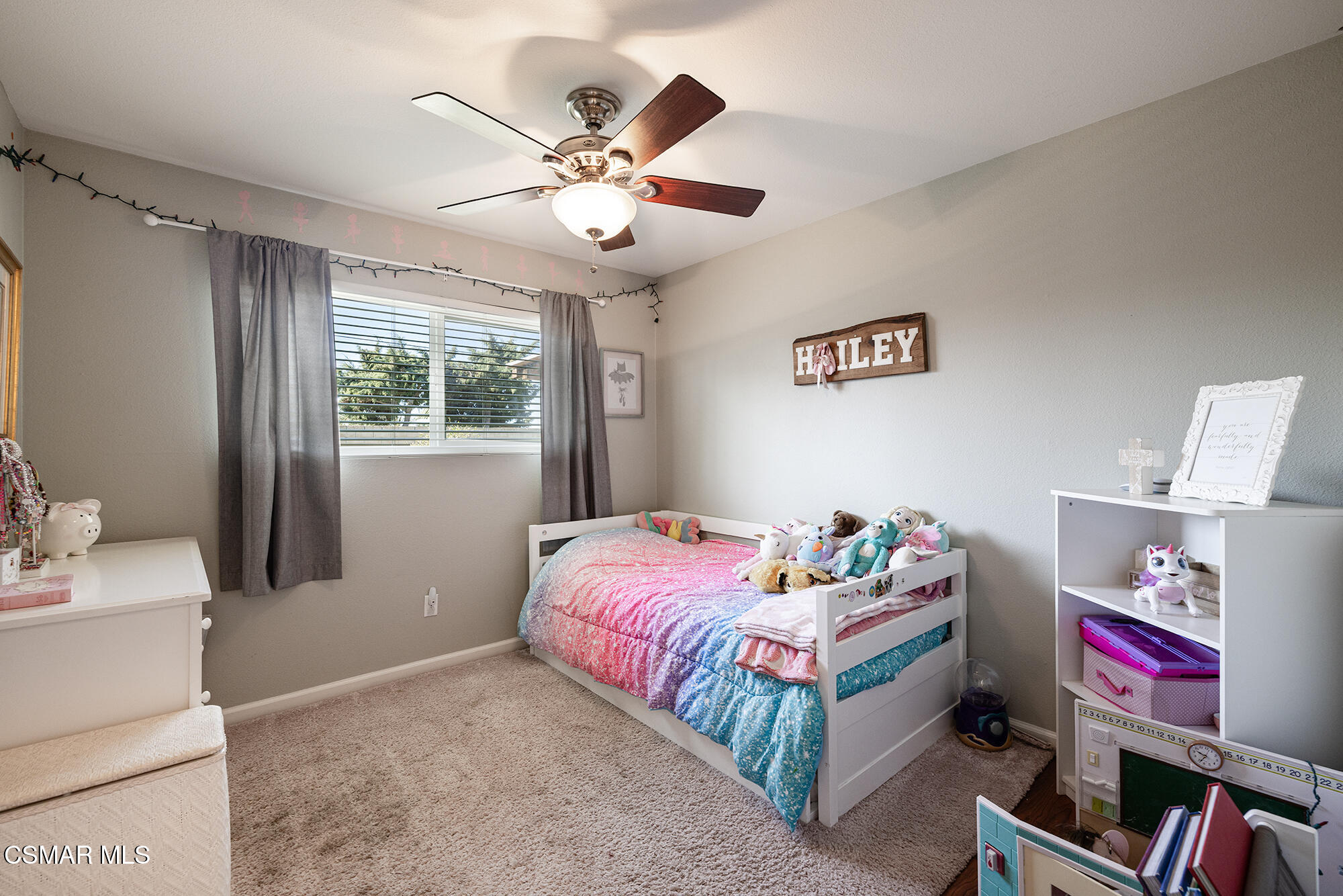 4828 Walnut Avenue Simi Valley, CA 93063 - Photo 18 of 25 a bedroom with a bed and a chandelier
