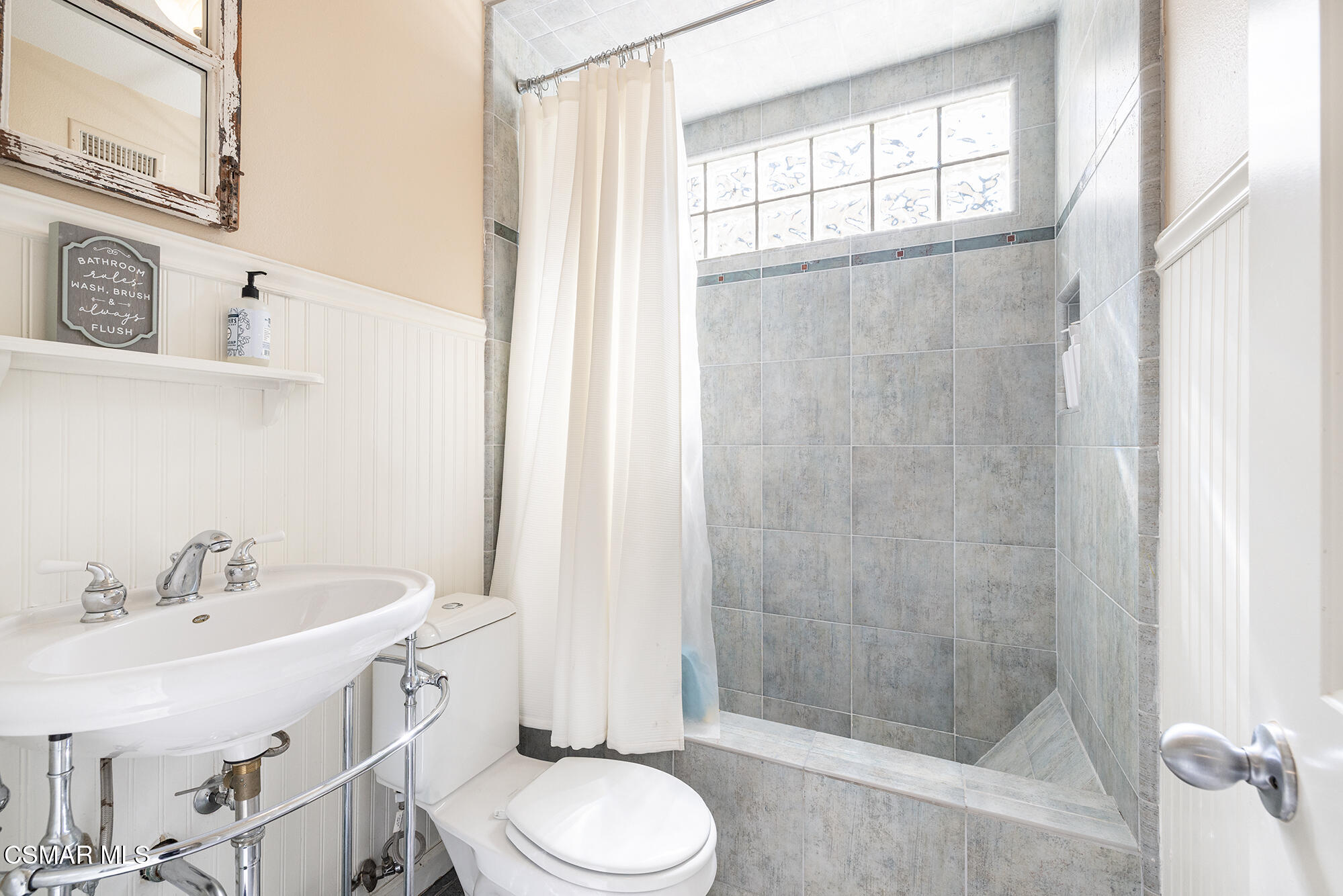 4828 Walnut Avenue Simi Valley, CA 93063 - Photo 19 of 25 a bathroom with a sink toilet and shower