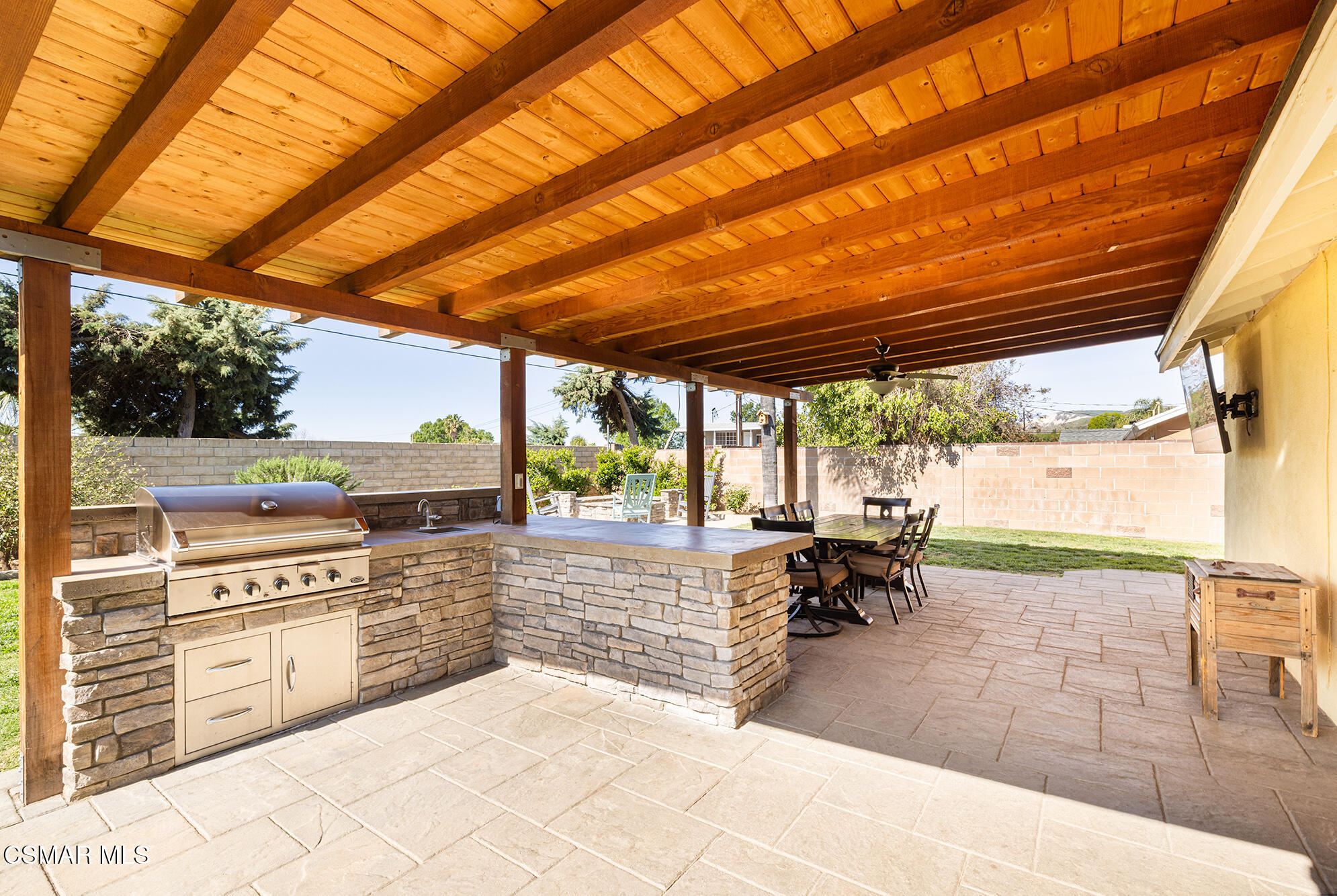 4828 Walnut Avenue Simi Valley, CA 93063 - Photo 4 of 25 a view of a patio with a dining table and chairs with wooden floor