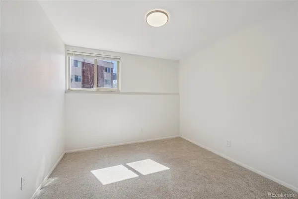 an empty room with a window