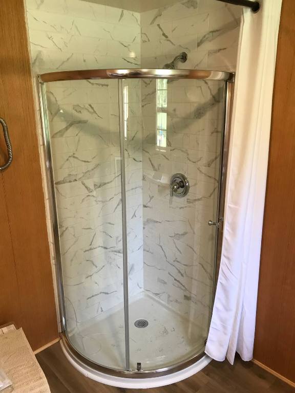 740 Trinity Street, Unit BACKYARD STUDIO Lockhart, TX 78644 - Photo 7 of 9 Bathroom featuring a standing shower