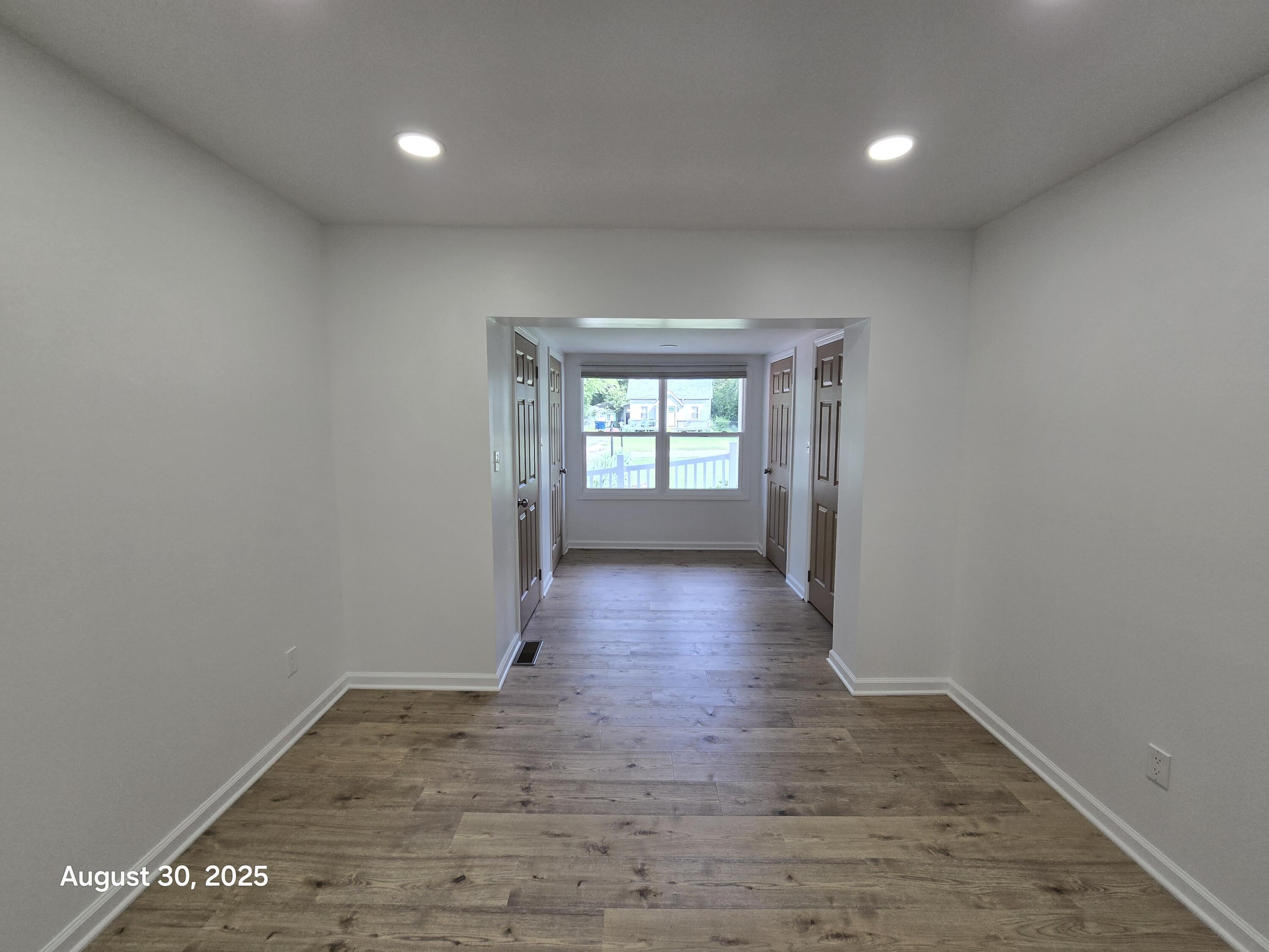 2345 Ranburn Drive Gary, IN 46408 - Photo 11 of 14 an empty room with wooden floor and windows
