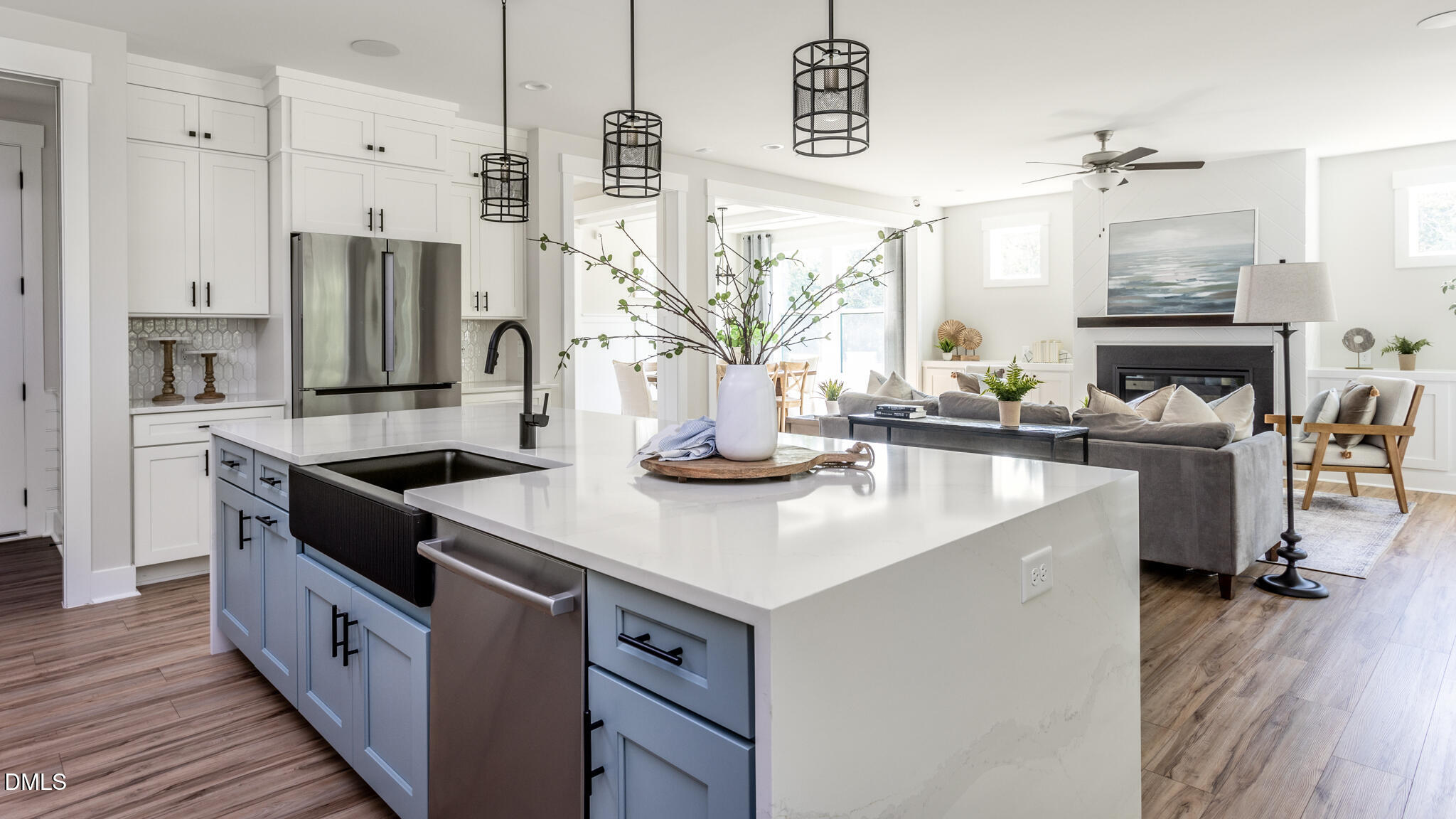 720 Fireship Road Fuquay-Varina, NC 27526 - Photo 11 of 16 a kitchen with stainless steel appliances granite countertop a sink stove and refrigerator