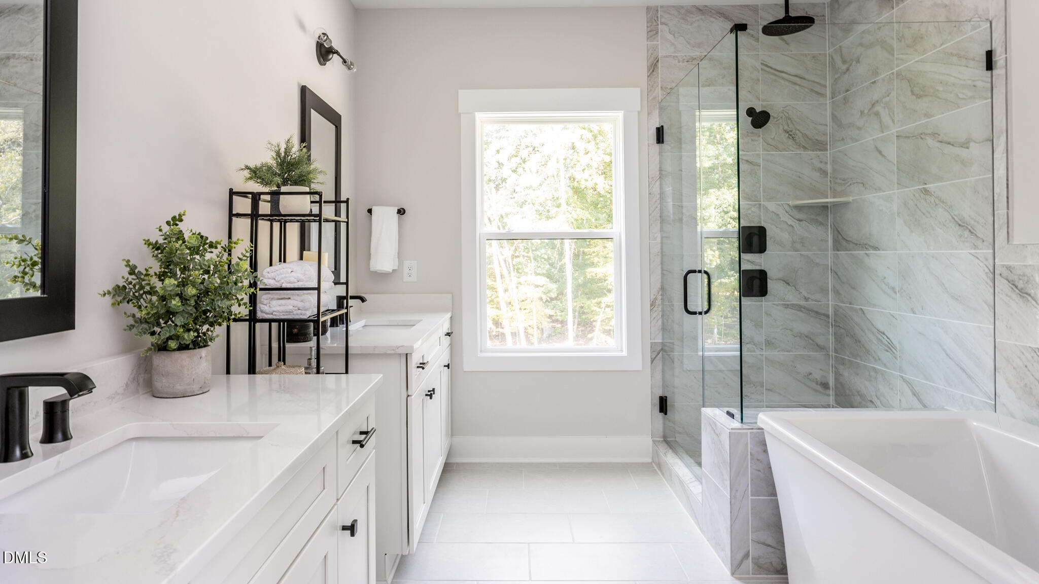 720 Fireship Road Fuquay-Varina, NC 27526 - Photo 15 of 16 a bathroom with a tub sink and mirror