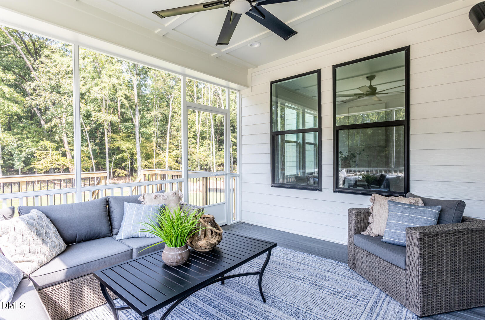 720 Fireship Road Fuquay-Varina, NC 27526 - Photo 16 of 16 a living room with furniture and a large window