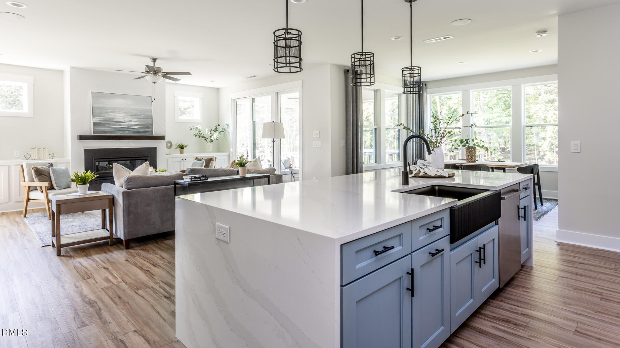 720 Fireship Road Fuquay-Varina, NC 27526 - Photo 2 of 16 a kitchen with stainless steel appliances granite countertop a sink counter space and wooden floor