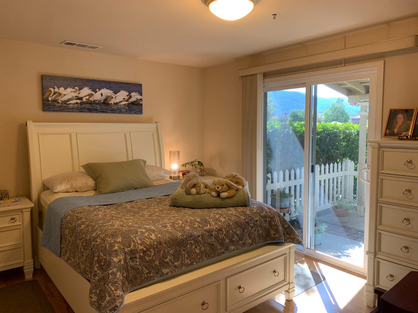 1554 Bianca Way Gilroy, CA 95020 - Photo 11 of 27 a bedroom with a bed and a large window