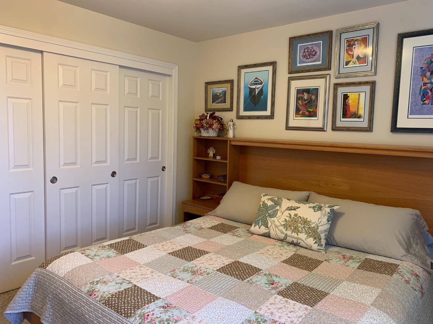 1554 Bianca Way Gilroy, CA 95020 - Photo 21 of 27 a bedroom with a bed and painting on the wall