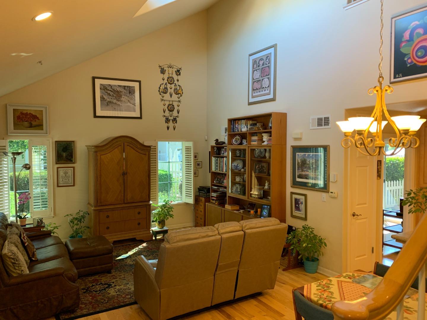1554 Bianca Way Gilroy, CA 95020 - Photo 4 of 27 a living room with furniture flowerpot and a chandelier