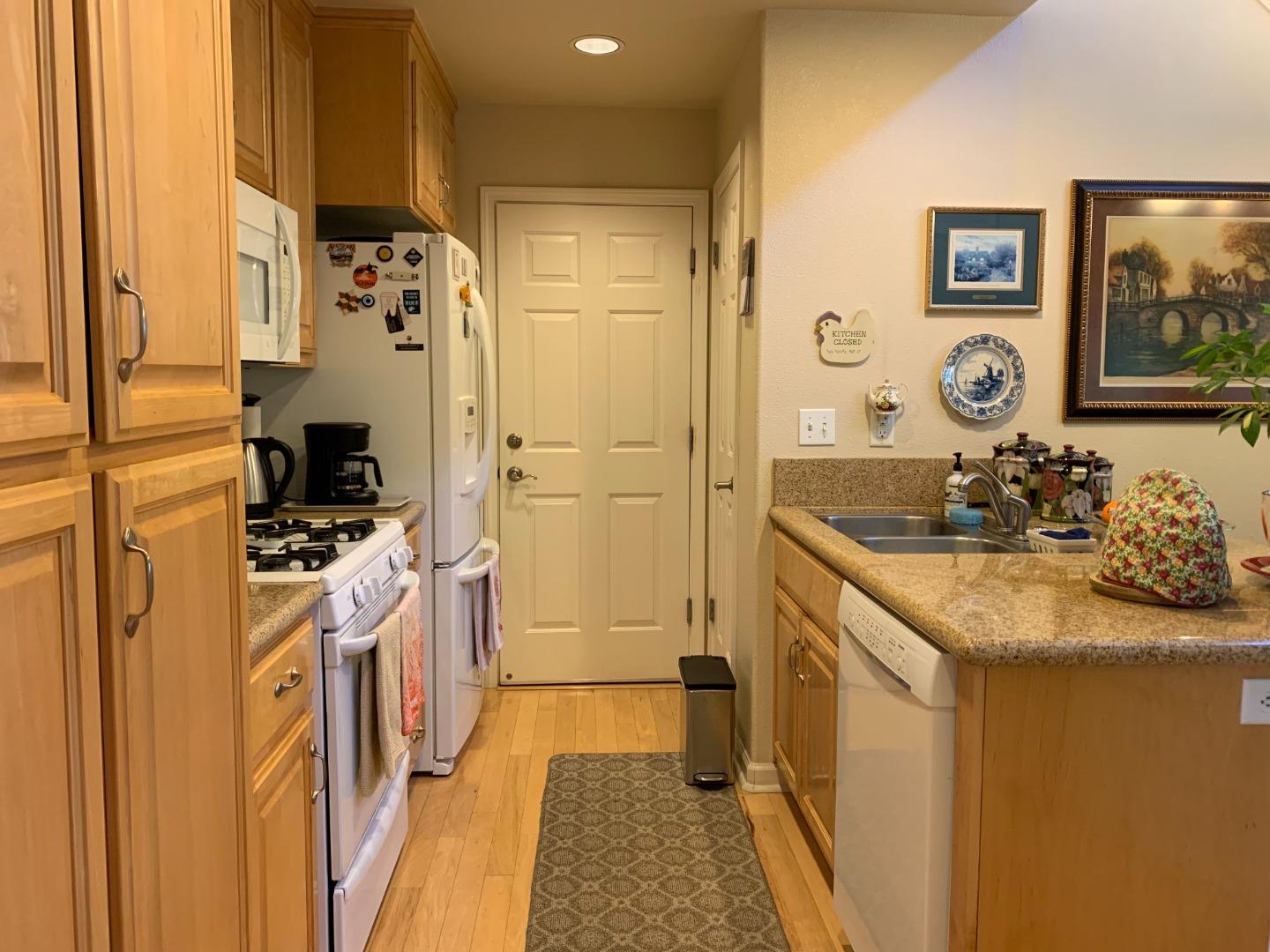 1554 Bianca Way Gilroy, CA 95020 - Photo 9 of 27 a bathroom with a sink a mirror and a shower