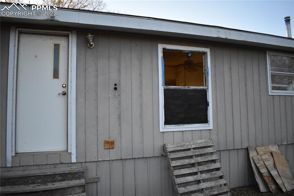 9250 County Road East Olney Springs, CO 81062 - Photo 19 of 32 a view of front door of a house