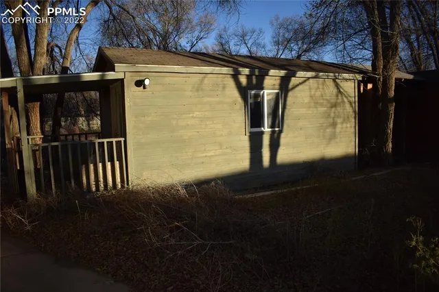 a view of swimming pool from a yard