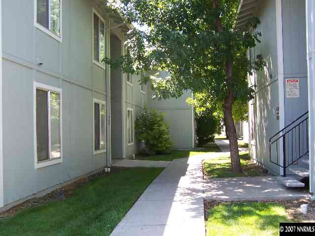 400 South Saliman Road, Unit A1 Carson City, NV 89701 - Photo 1 of 3 a view of a house with a yard