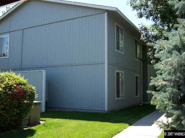 400 South Saliman Road, Unit A1 Carson City, NV 89701 - Photo 3 of 3 a backyard of a house with lots of green space