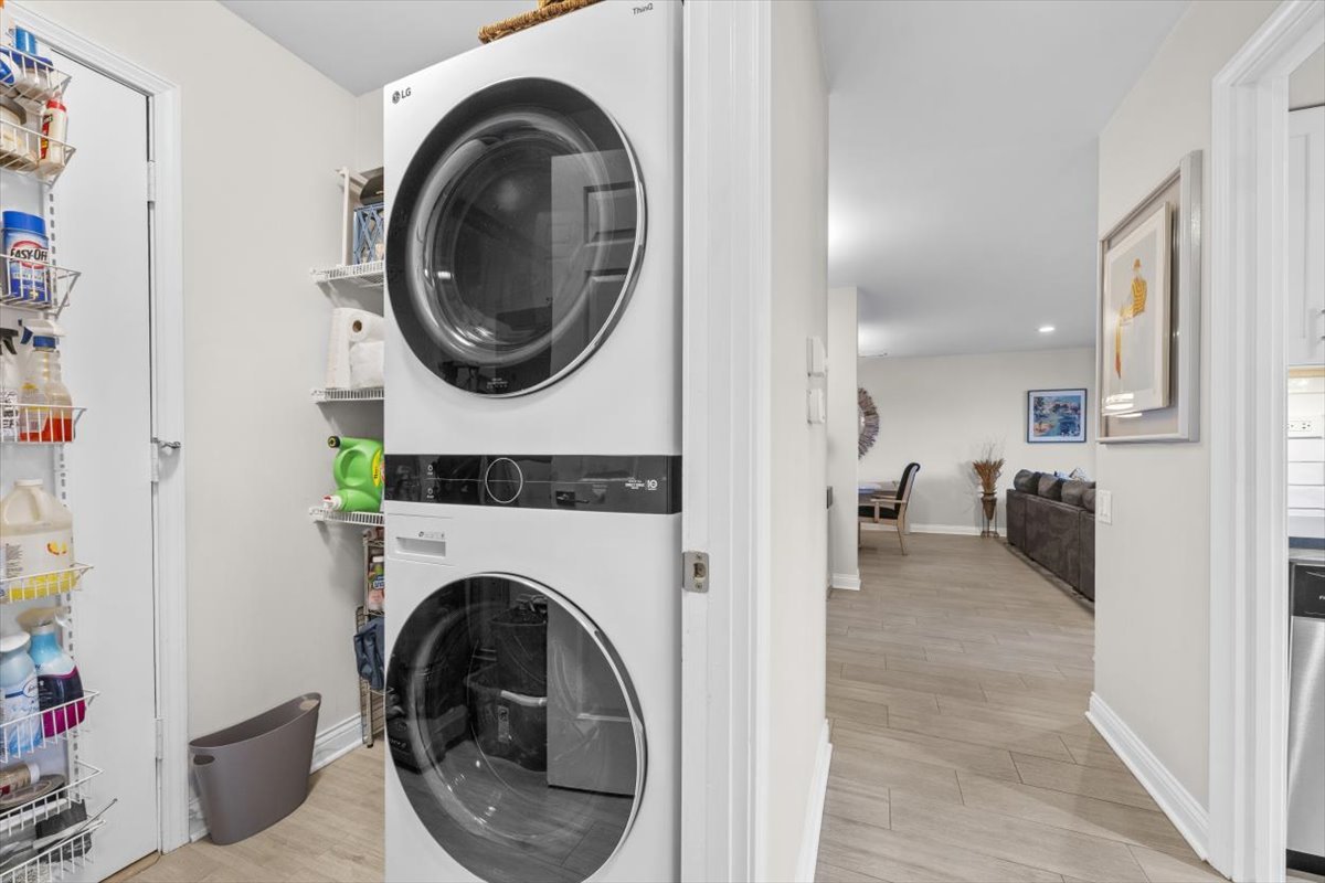 3741 Mission Hills Road, Unit 410 Northbrook, IL 60062 - Photo 14 of 21 a view of a hallway with washer and dryer